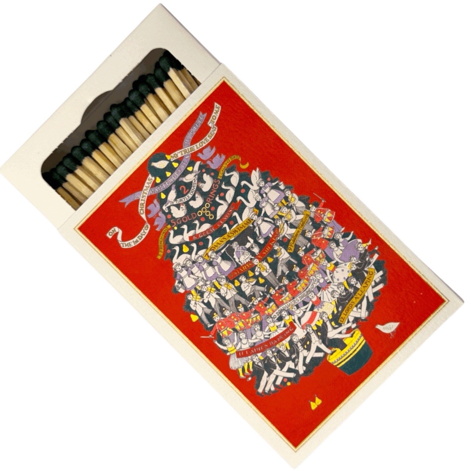 An open matchbox with a bright red cover featuring a detailed multicolor illustration of a festive, crowded scene. The natural wood matchsticks inside are visible, set against a plain white background.