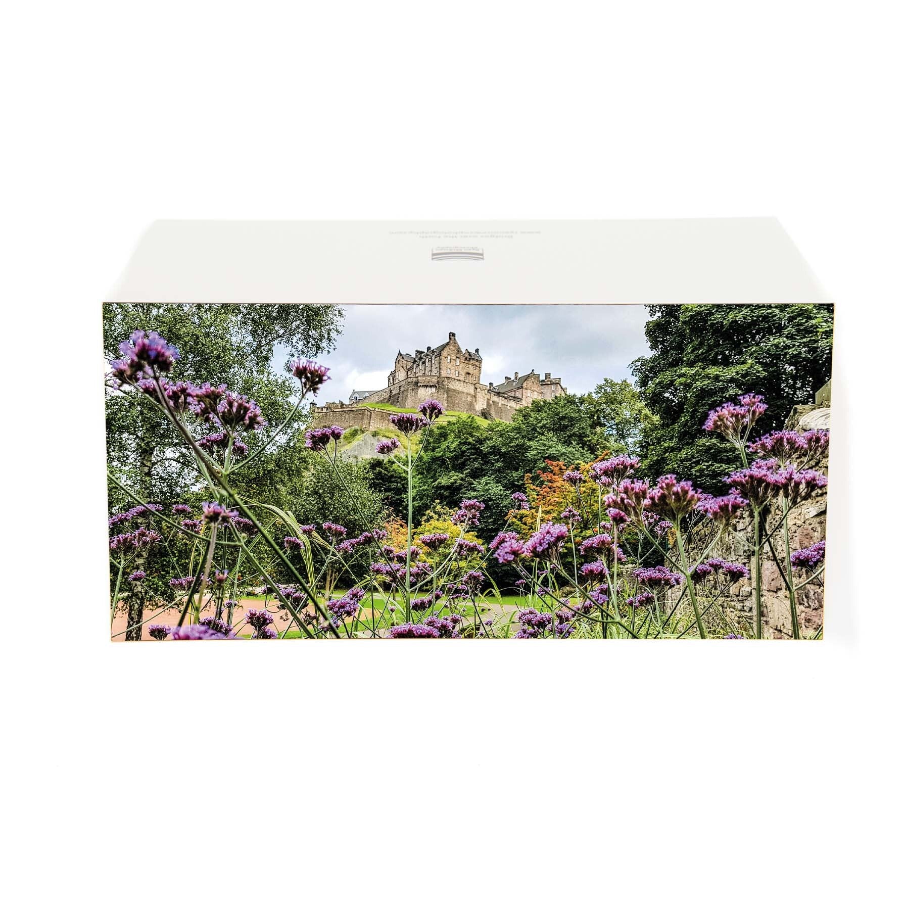 An image of Edinburgh Castle with purple verbena flowers in the foreground on a card.