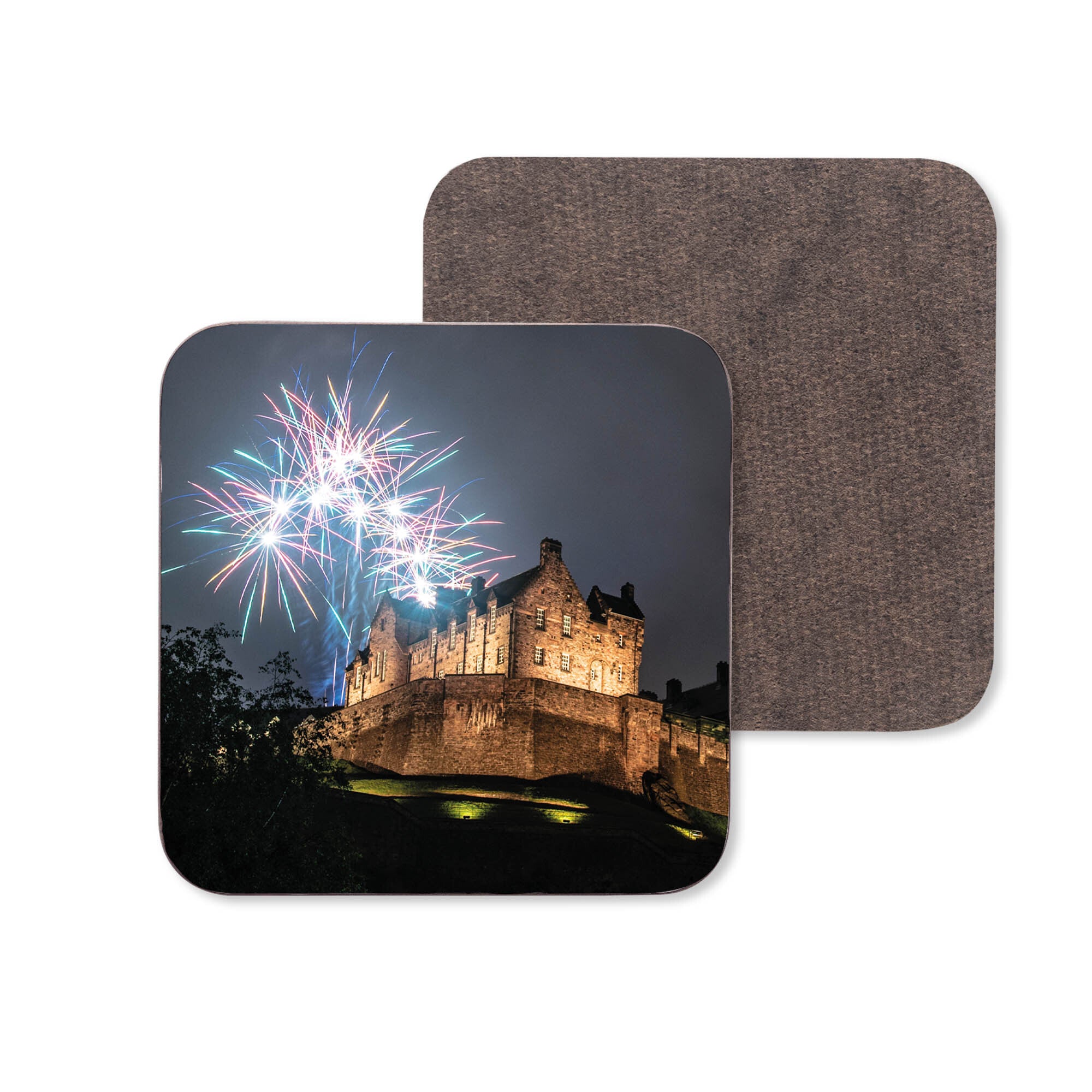 An image of Edinburgh Castle with fireworks above it on a coaster.