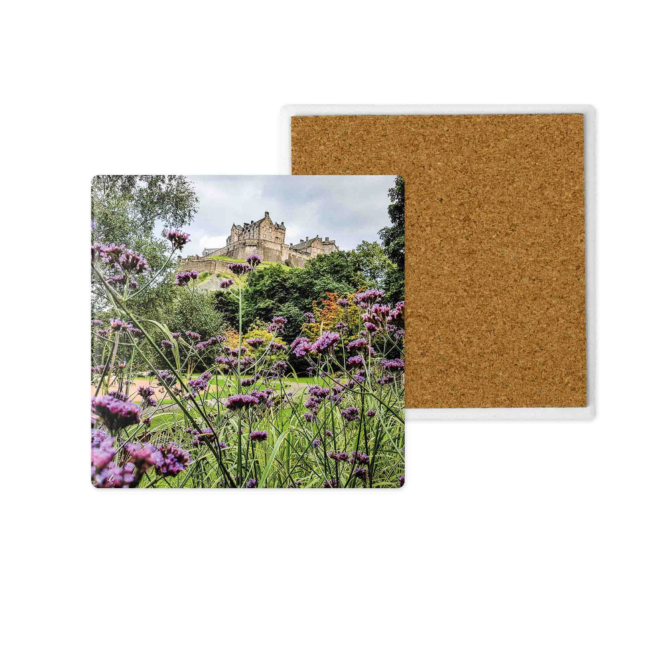 An image of Edinburgh Castle with verbena flowers in the foreground on a ceramic coaster.