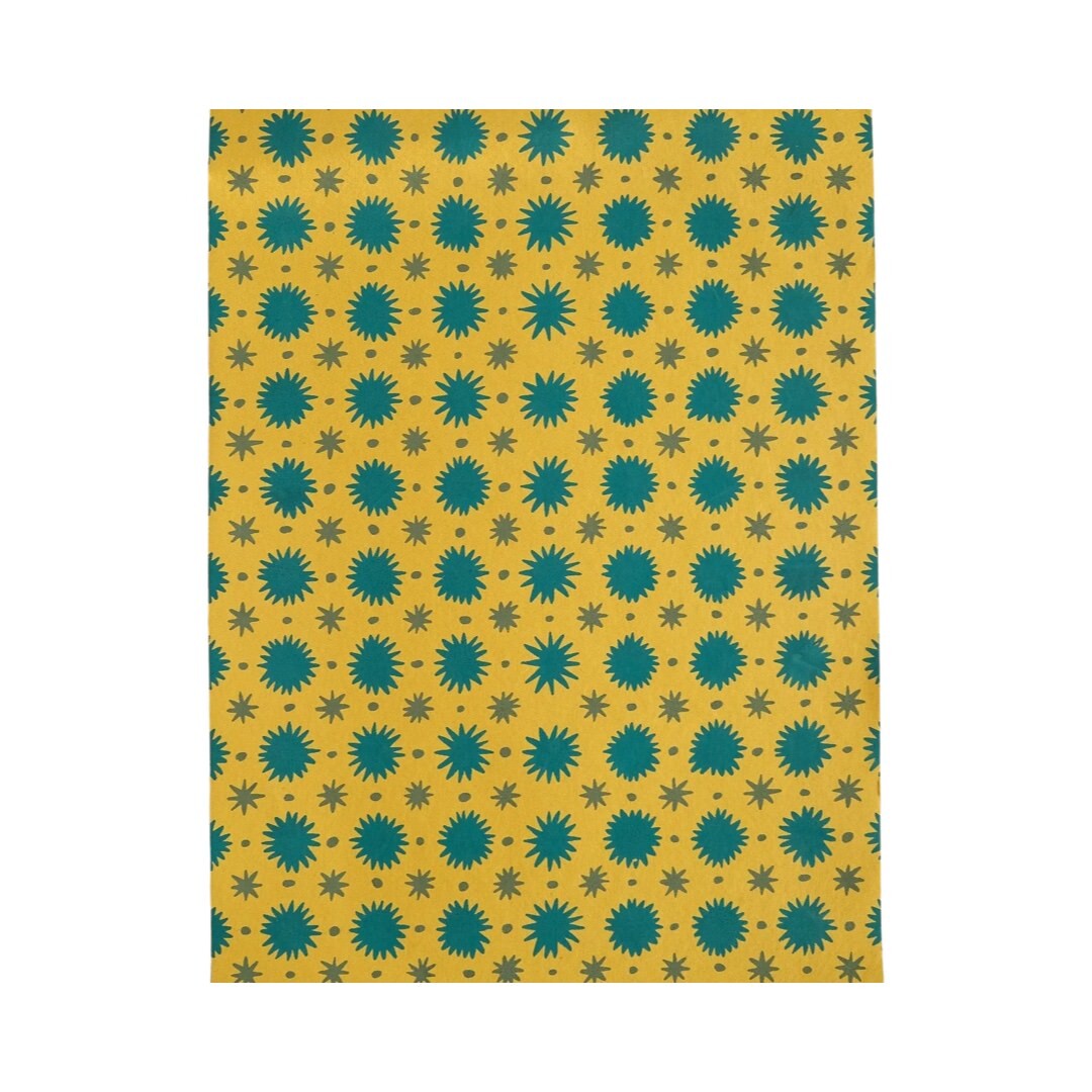A3 scrapbook with a yellow cover withe green stars.