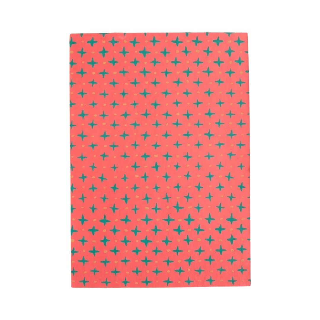 A4 pink scrapbook with green stars and yellow dots.