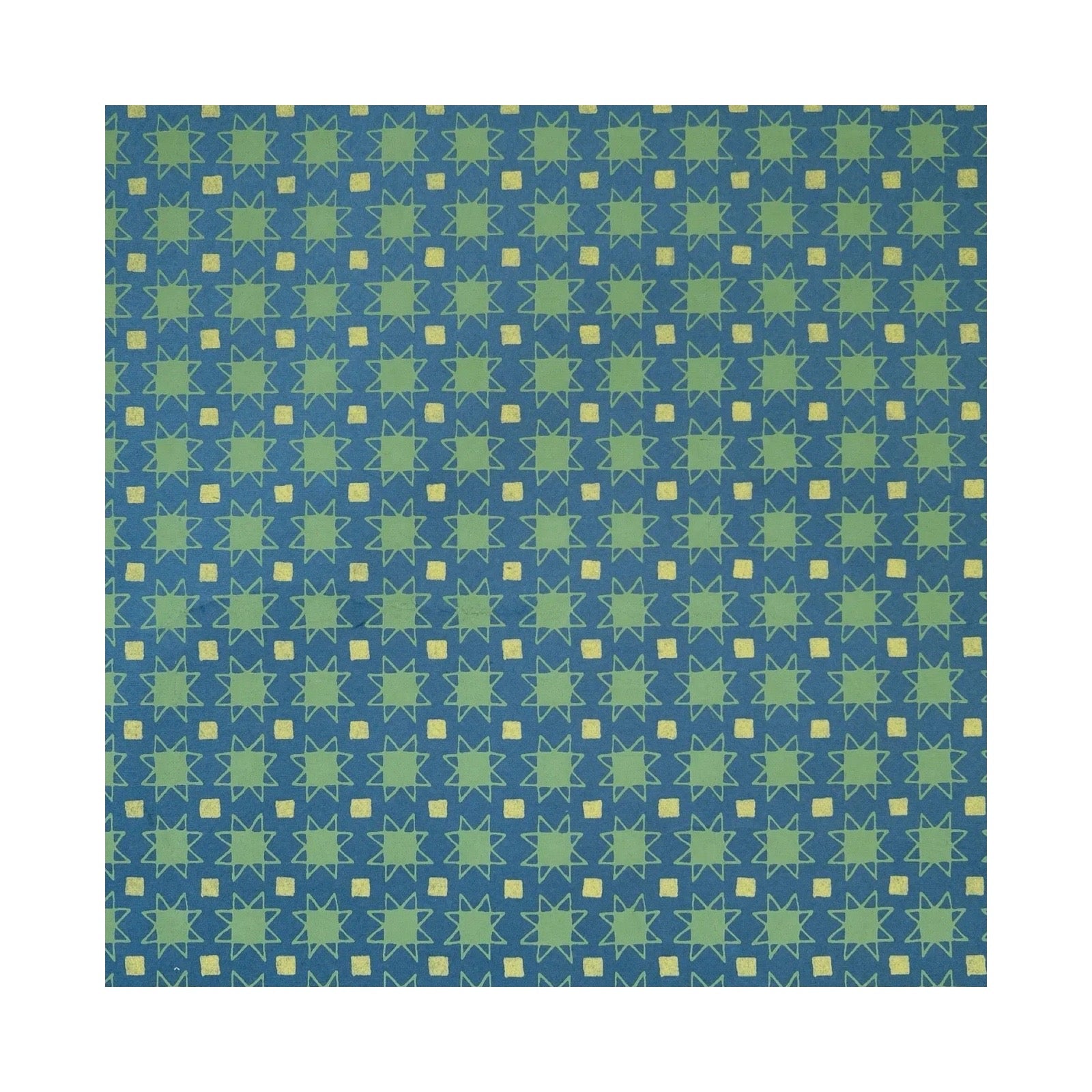 Patterned paper with green and blue geometric design on a white background.