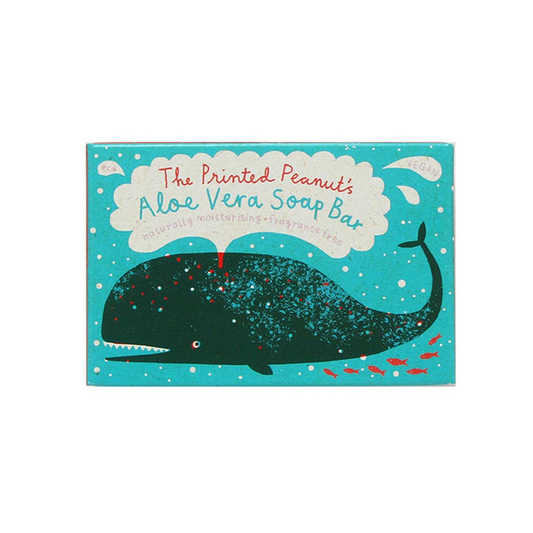 Aloe Vera soap bar packaging with whale illustration on a blue background.