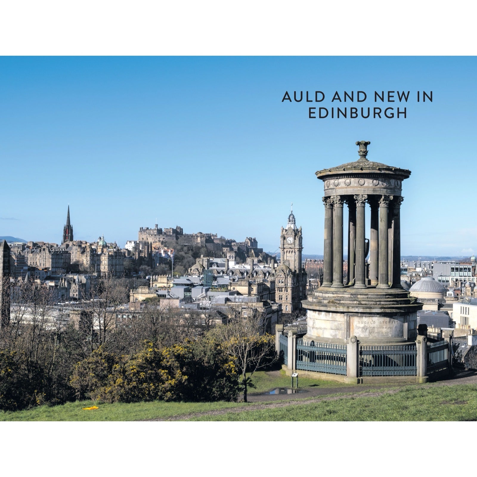 Edinburgh cityscape with a prominent monument and skyline on a clear day.