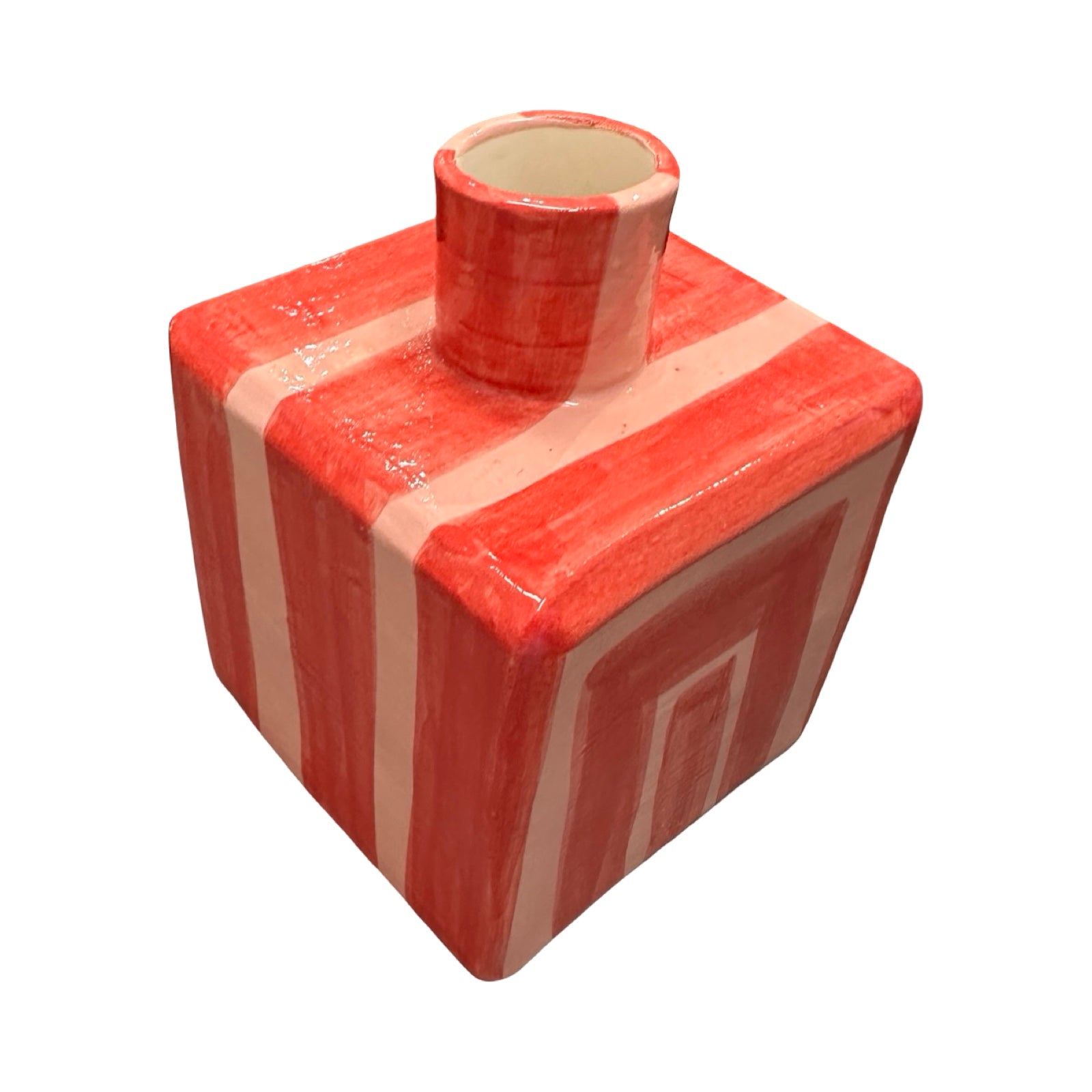 Red and white striped vase on a white background.