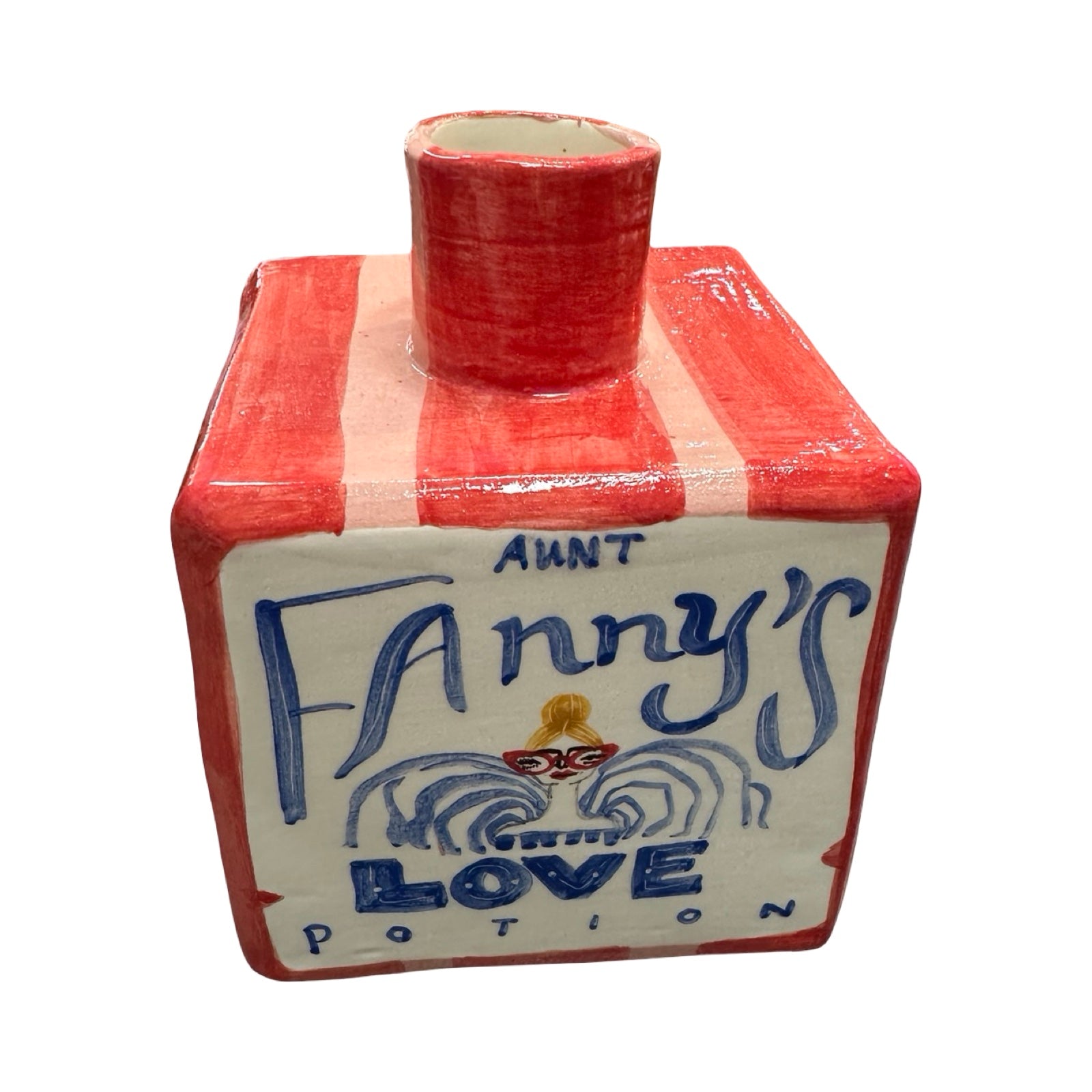 Ceramic vase labeled 'Aunt Fanny's Love Potion' with red and white checkered pattern.