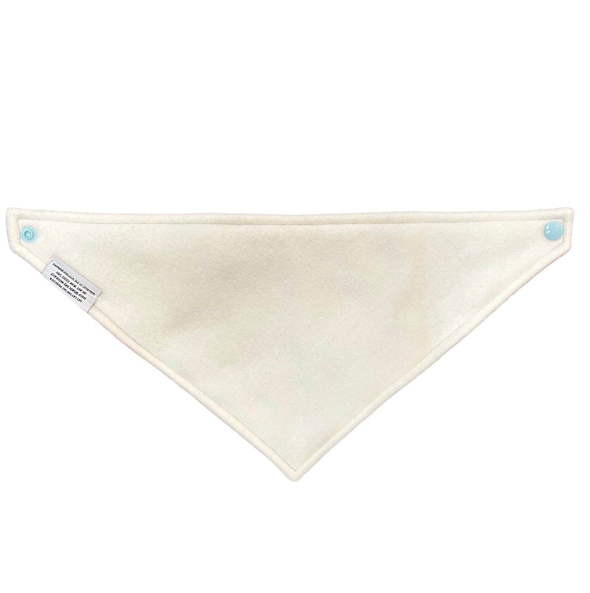 Showing the open reverse of the bandana bib which has cream coloured fleece lining.