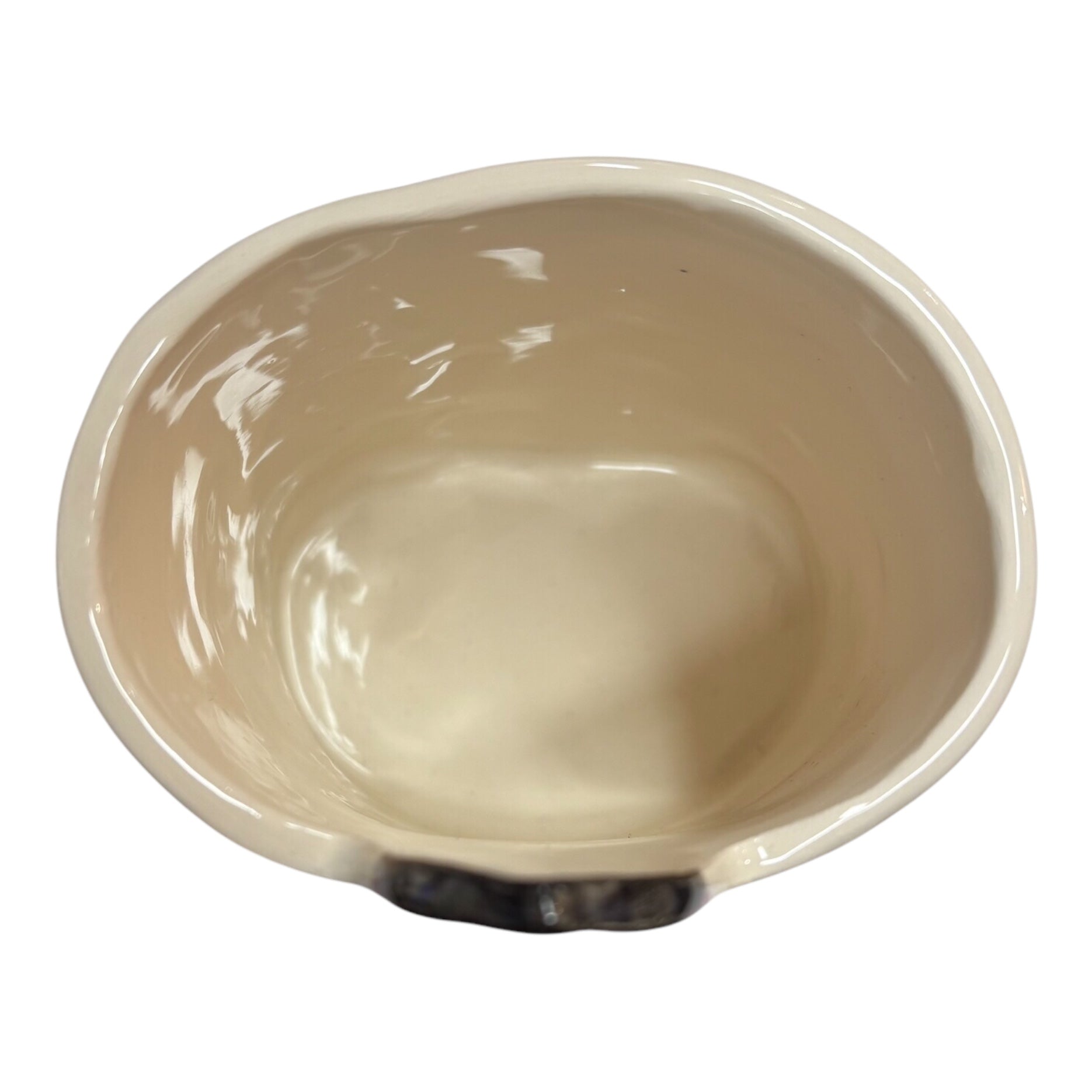 The inside of a handmade ceramic pot.