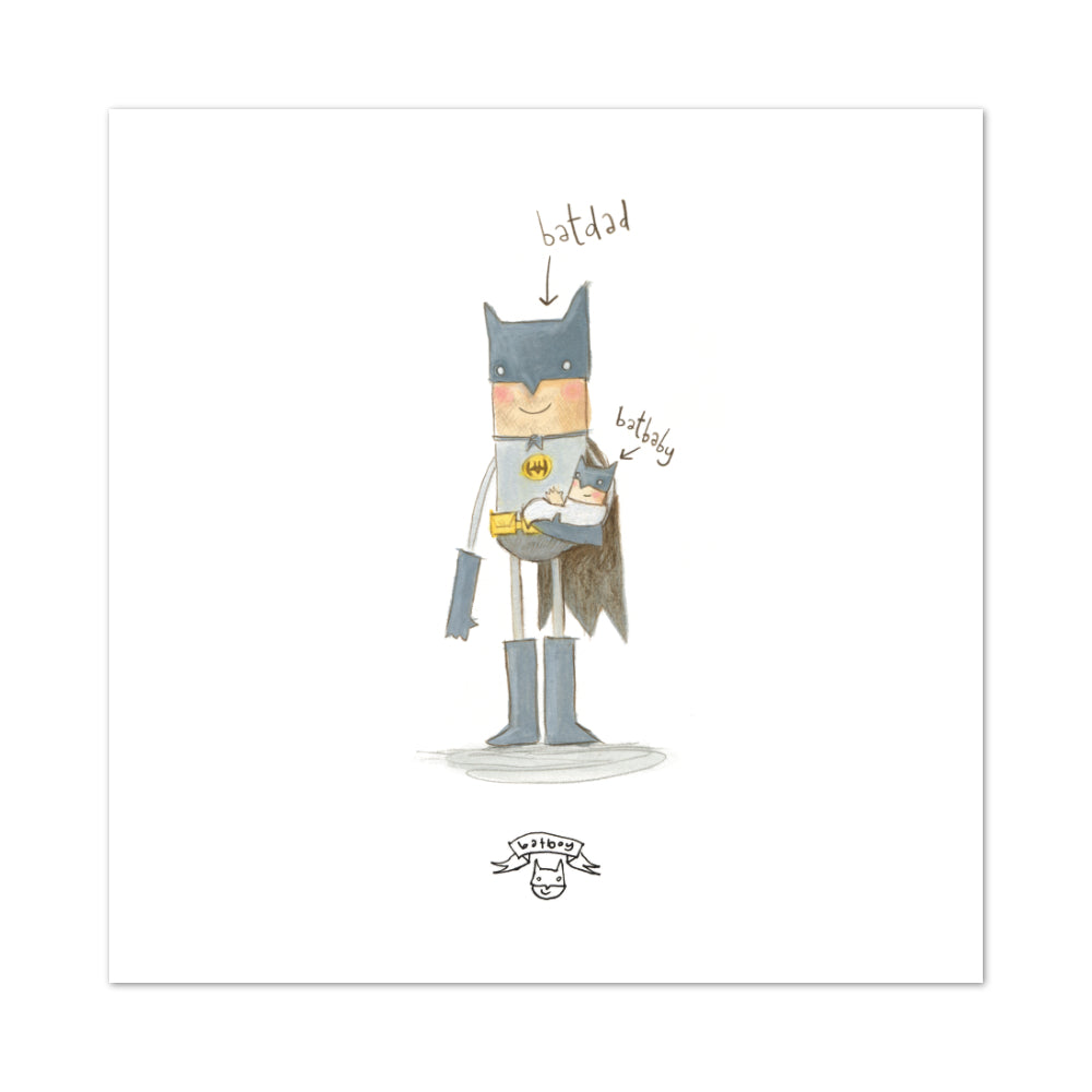 Batman holding a Batbaby, both labelled by arrows.