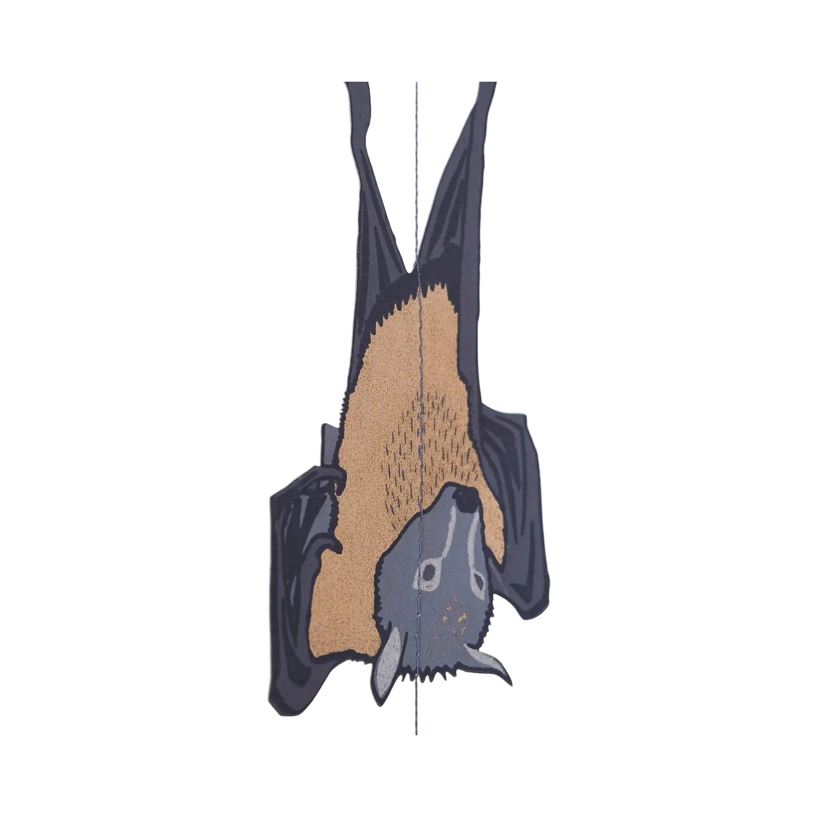 A grey, gold and black bat hanging upside down from a vertical paper garland.