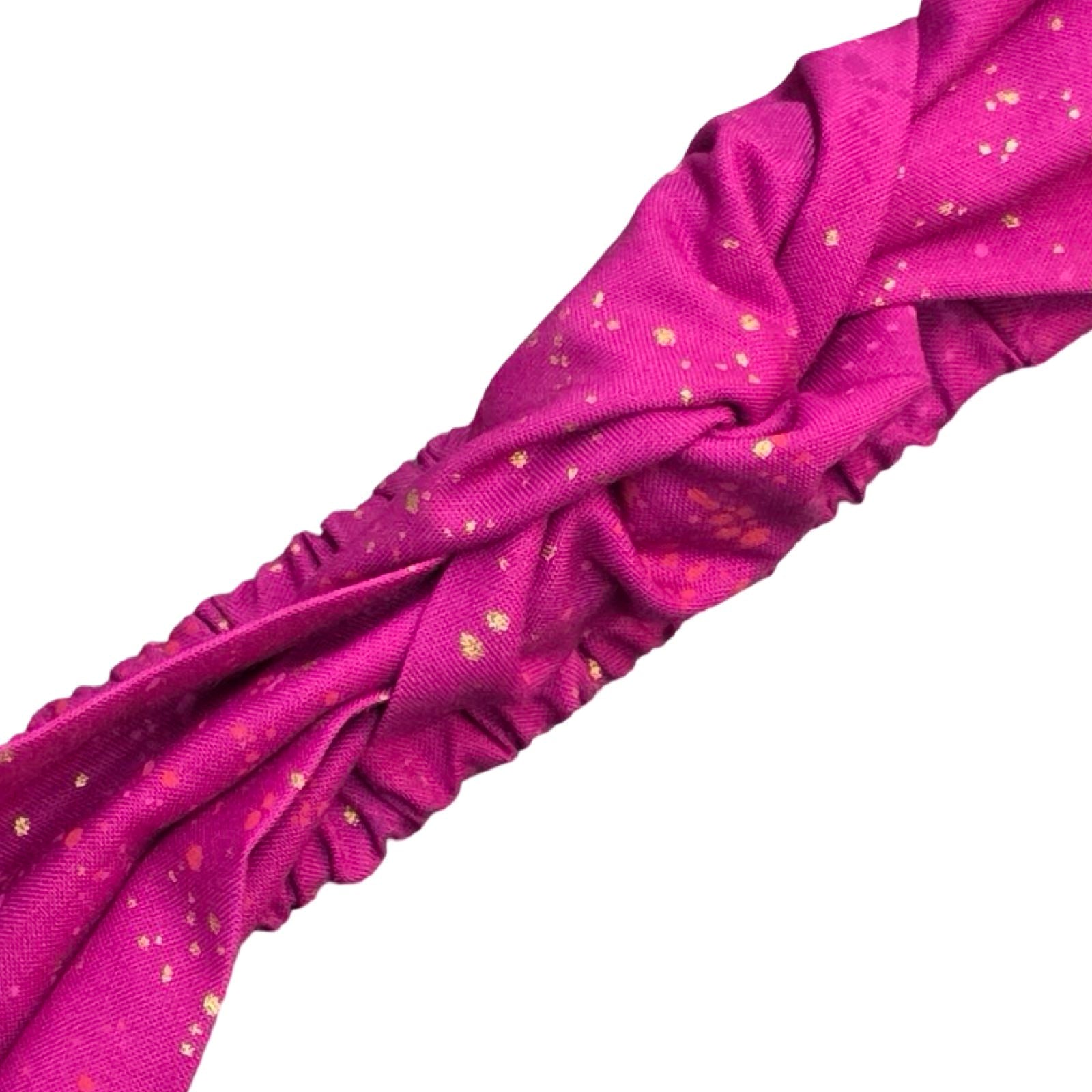 This handmade berry pink speckled knotted headband is made from 100% cotton fabric with metallic speckles.