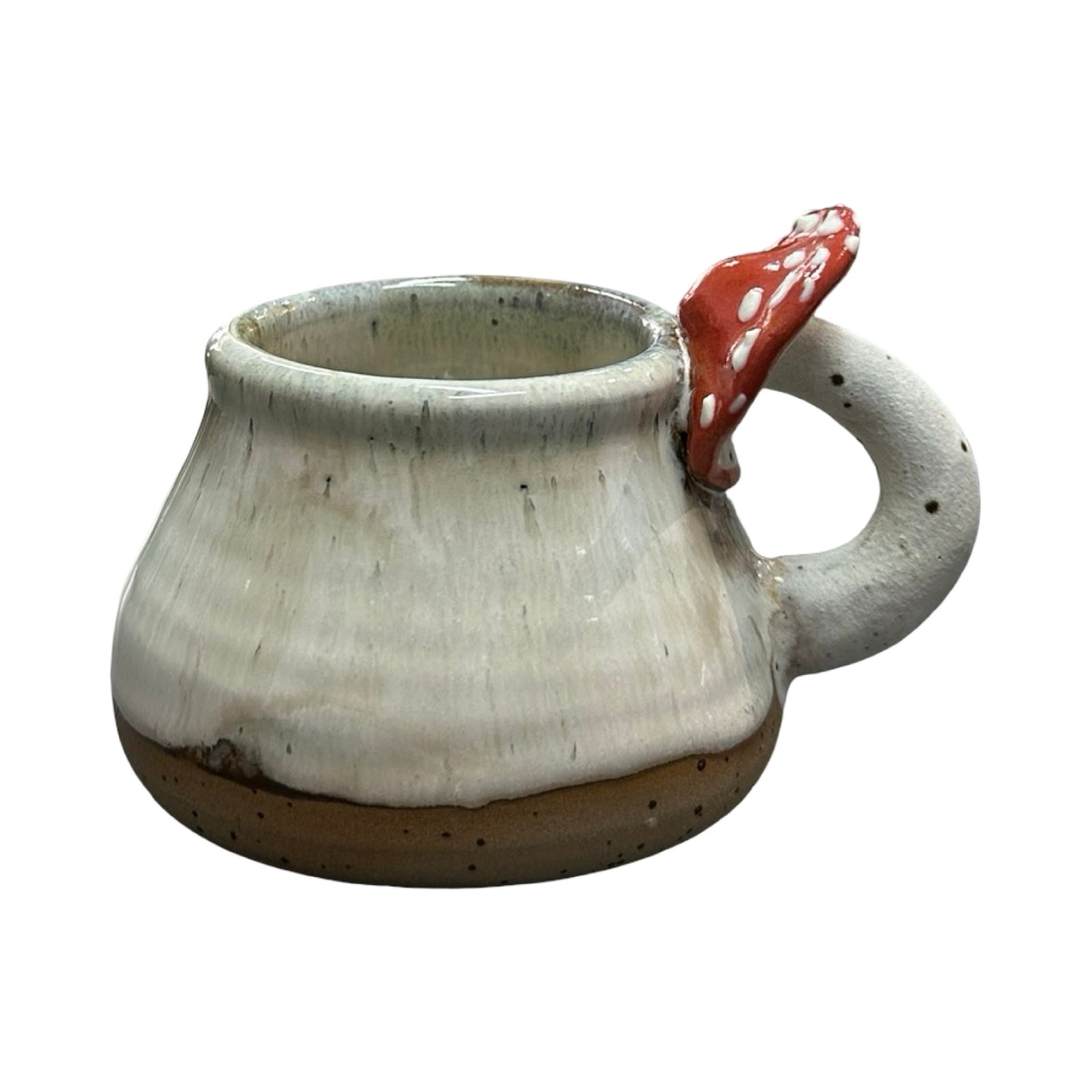 Ceramic mug with a unique handle shaped with a mushroom on a white background.