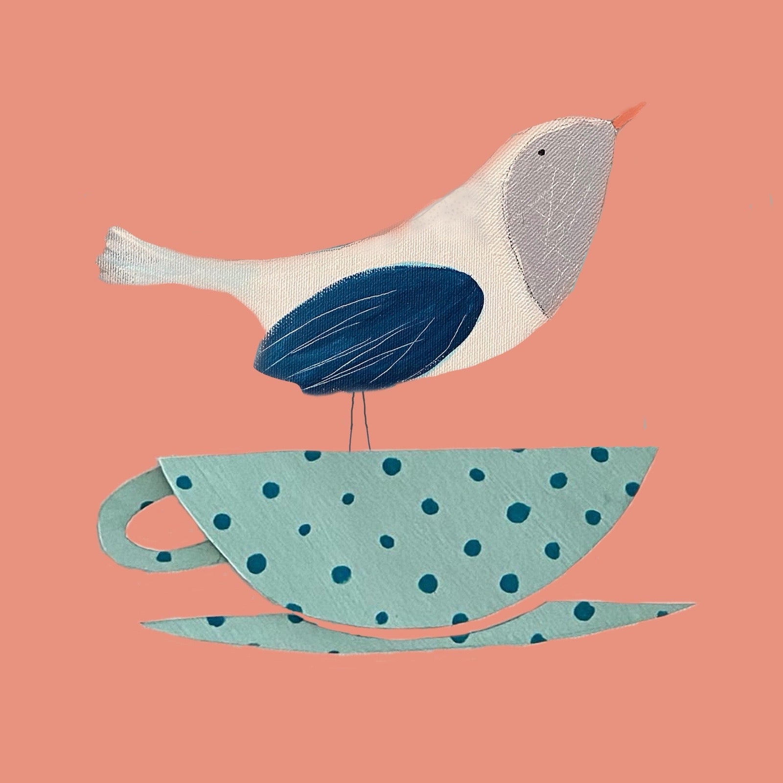 A whimsical illustration of a small bird with a white body, gray head, and dark blue wing perched on a light blue polka-dotted teacup and saucer against a solid coral background.