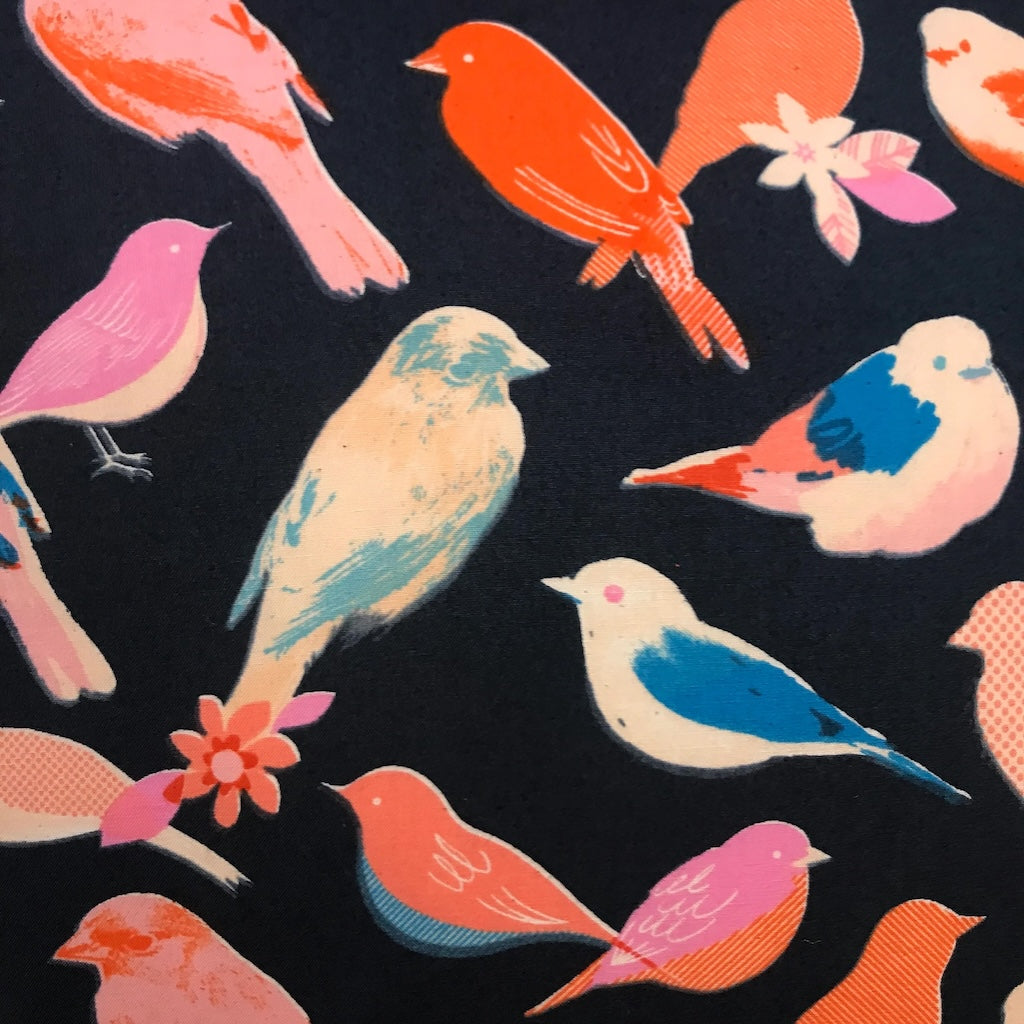 Pattern of colorful birds on a dark background.