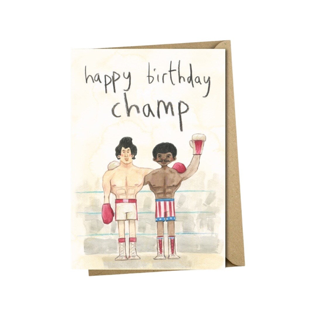 Birthday card featuring an illustration inspired by the film Rocky of Rocky Balboa and Apollo Creed and the text 'Happy birthday champ'.
