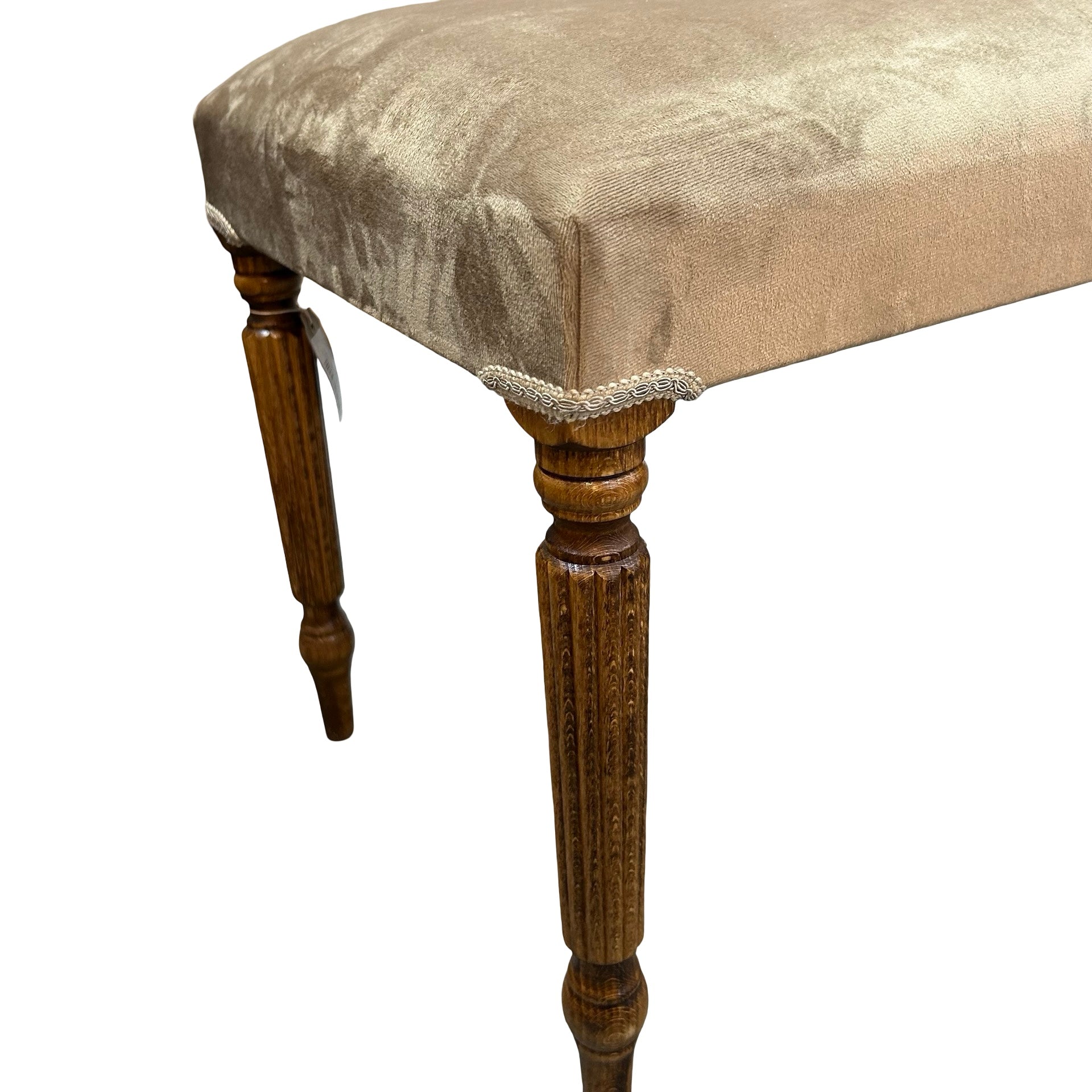 Decorative bench with beige upholstered seat and wooden legs on a white background.
