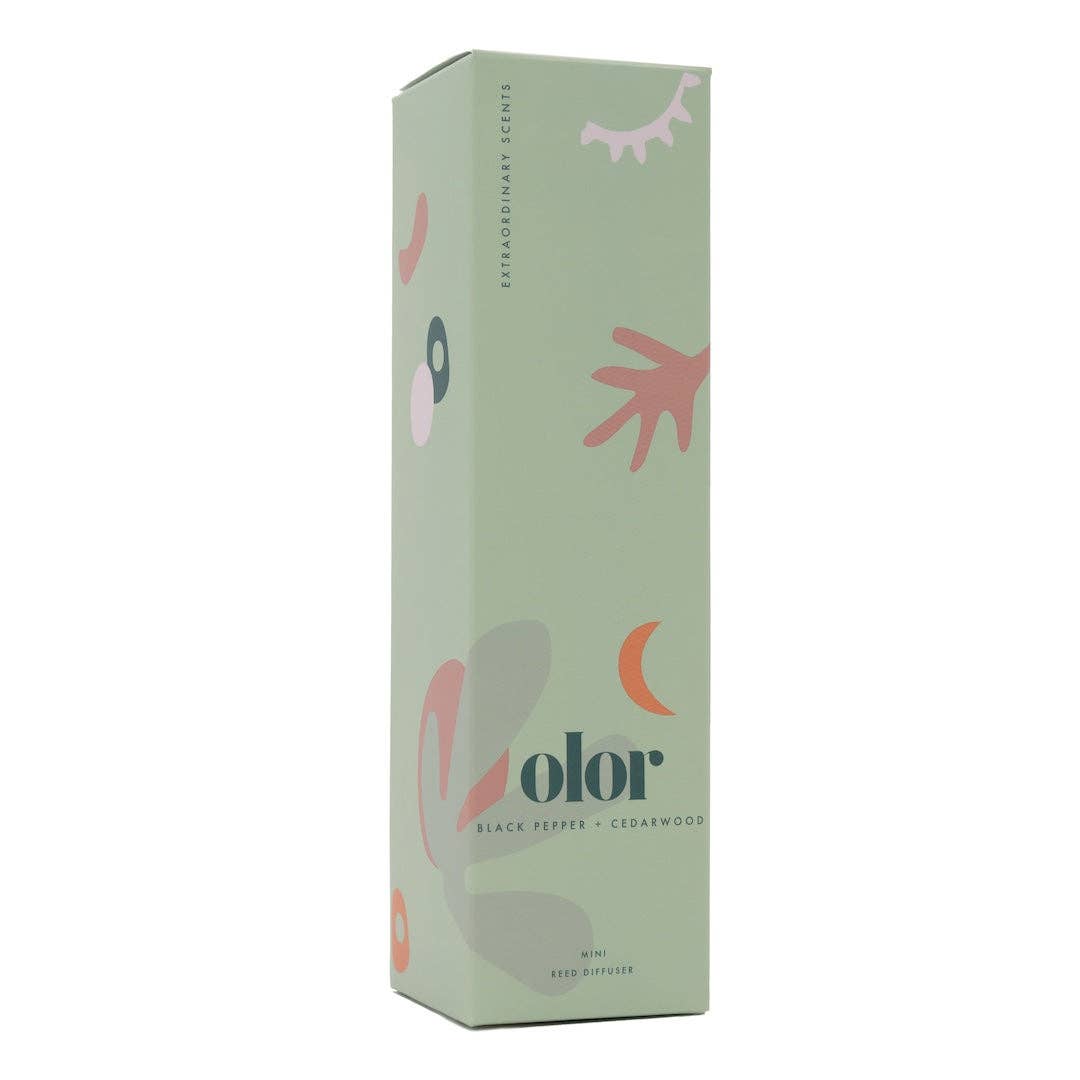 Product packaging with abstract designs and 'olor' branding on a light green background