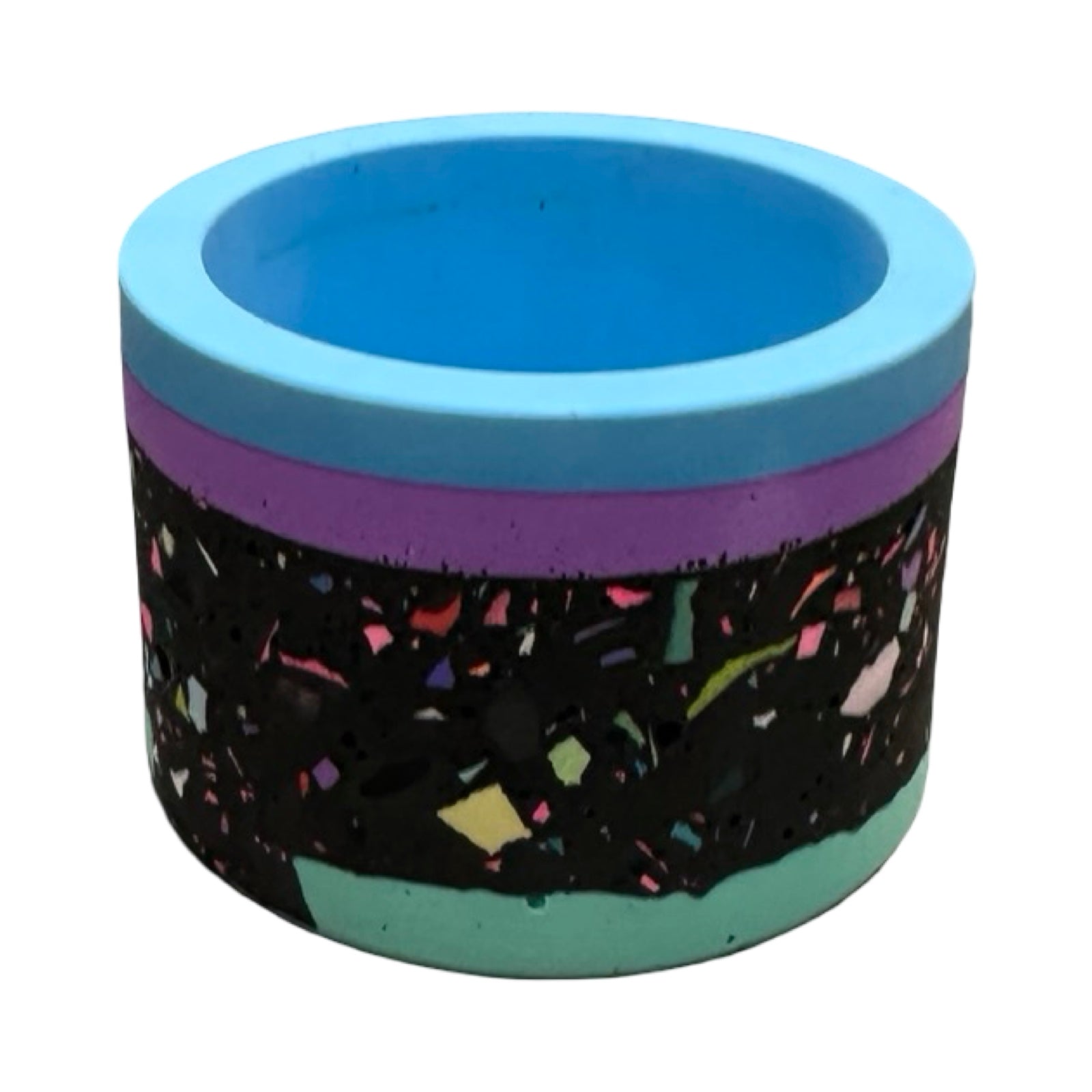 Colorful mini pot with blue top and multicolored base on a white background.