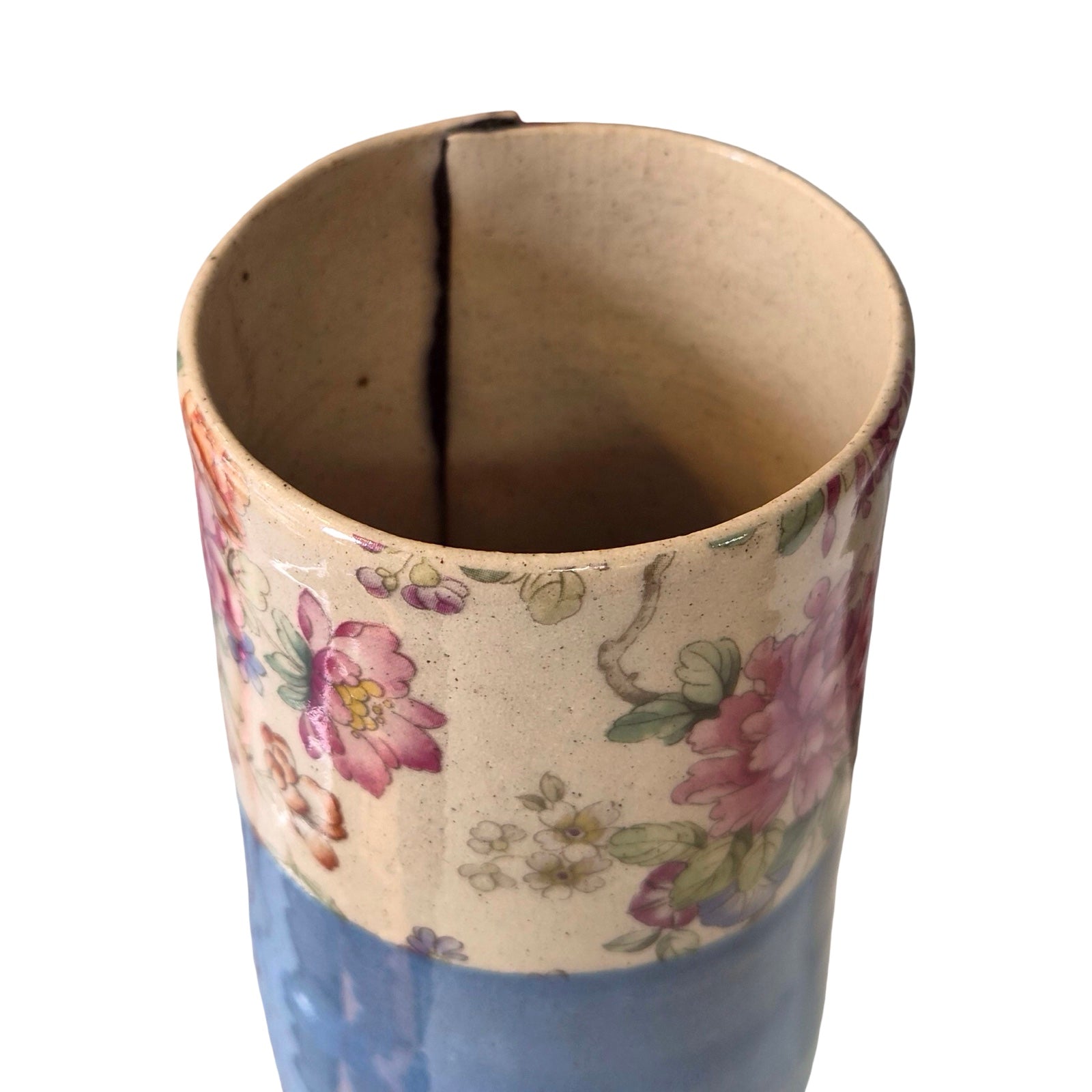 Cylindrical vase with floral design on a white background.