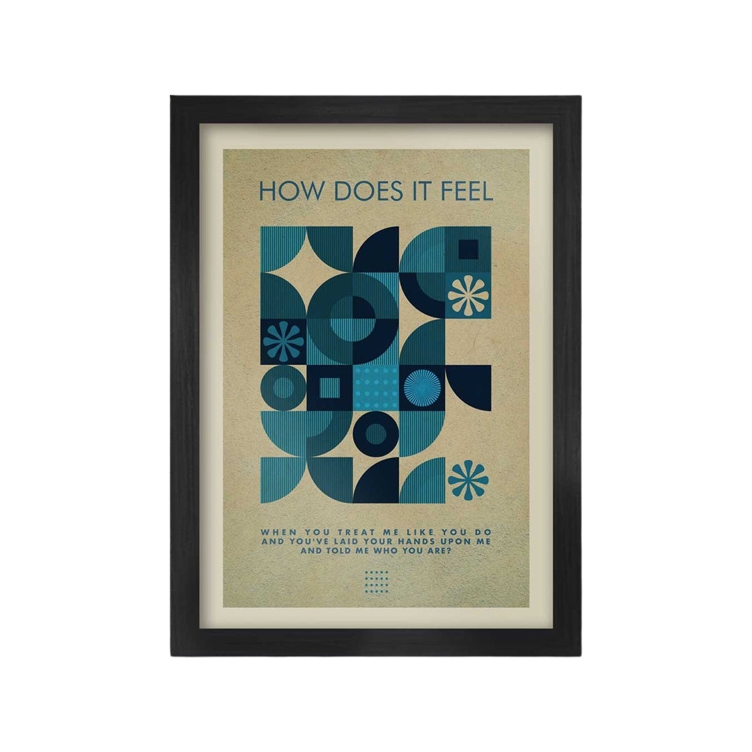 A framed A3 print featuring a geometric design in shades of blue with text from the New Order song 'Blue Monday'.