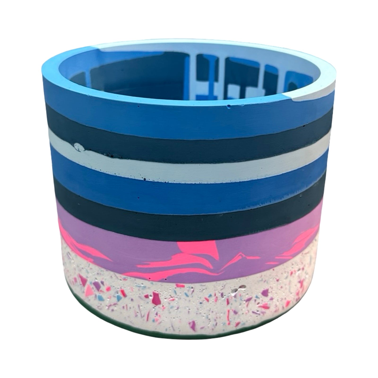 Colourful striped planter with a textured base on a white background.