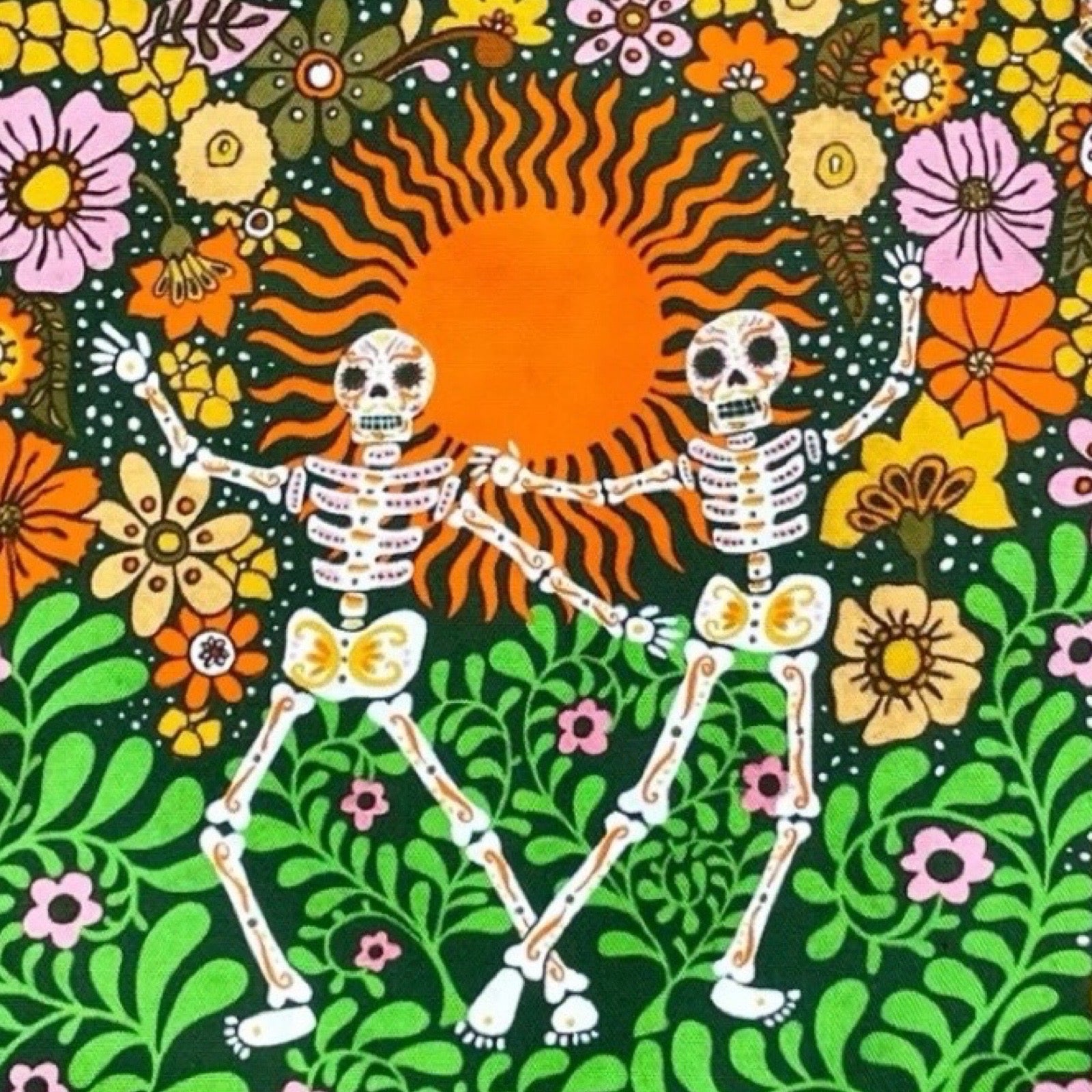 Fabulous tote bag featuring two skeletons dancing in a garden among bright flowers and green ferns.