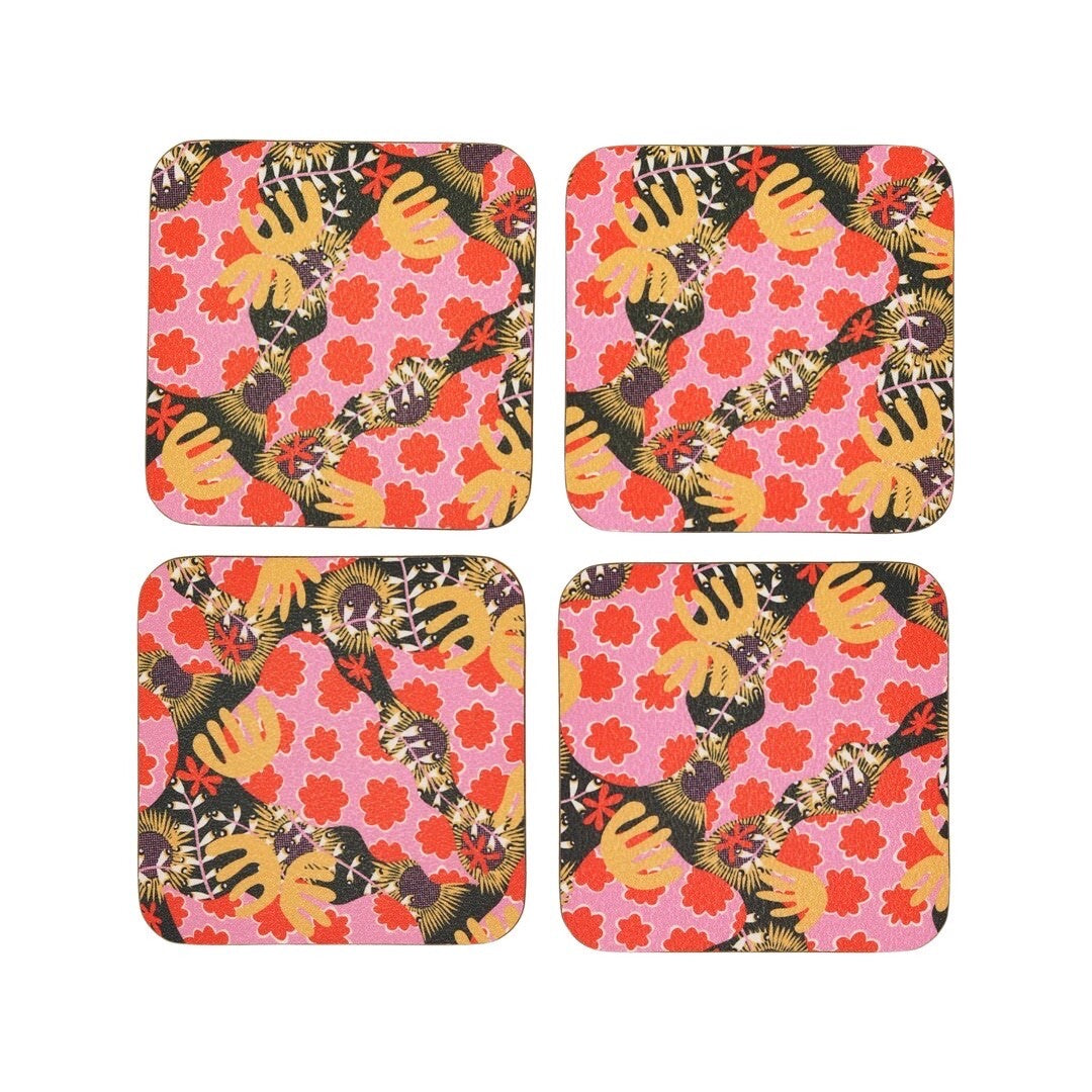 A 4 pack of abstract botanical coasters in a red, pink and yellow design.