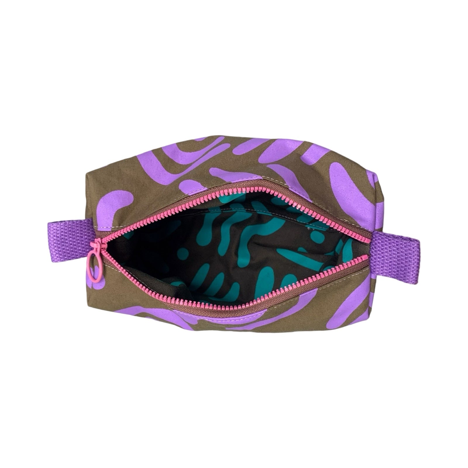 purple and grey abstract boxy cosmetic bag open to show the grey and turquoise waterproof lining.