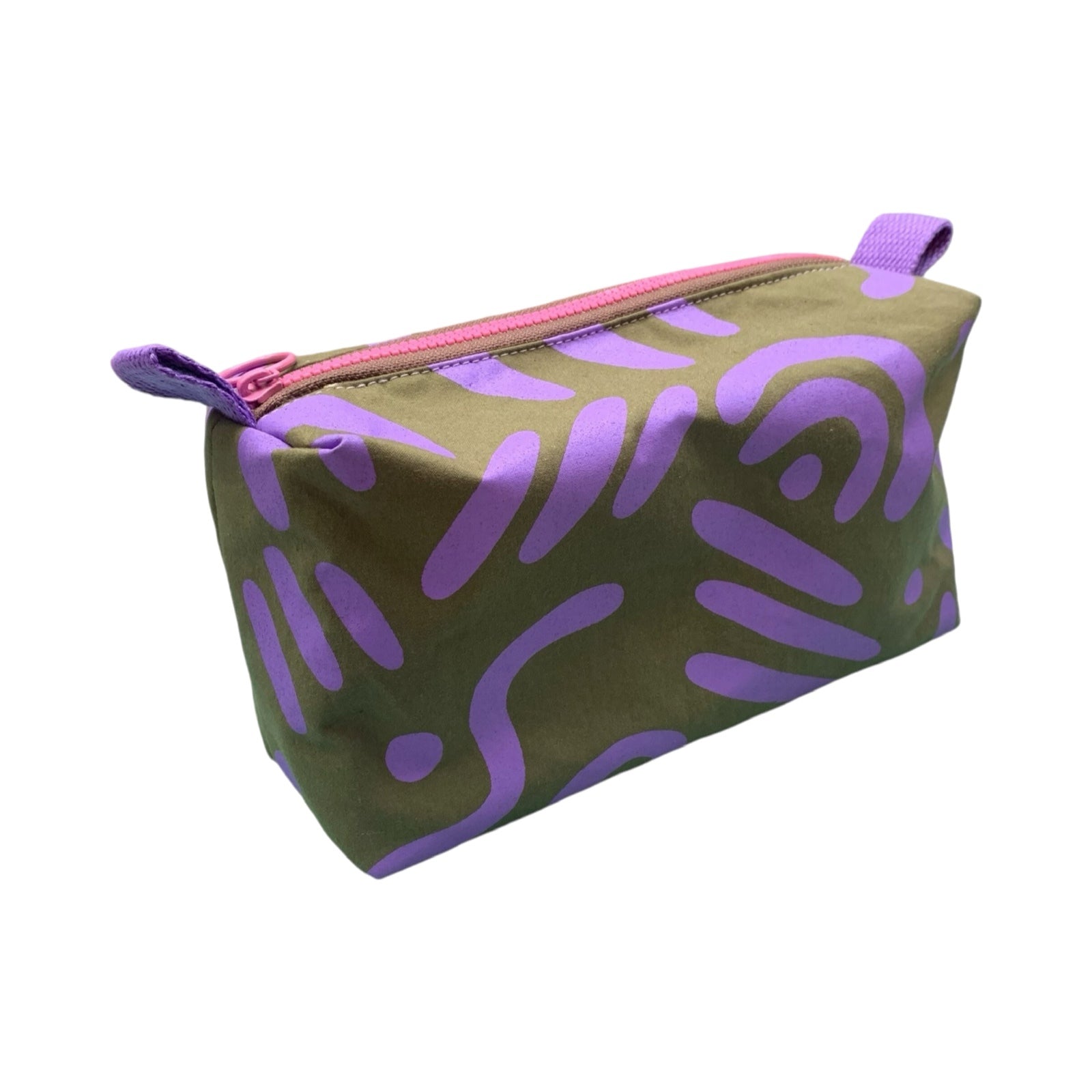 A grey boxy cosmetic bag with a purple abstract design.