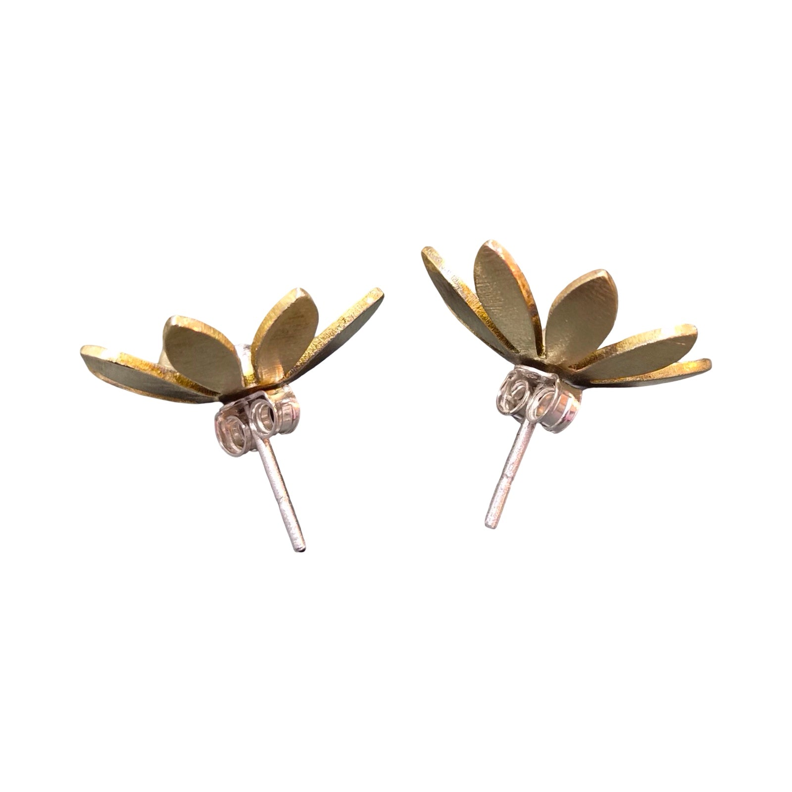 Gold flower-shaped earrings on a white background.