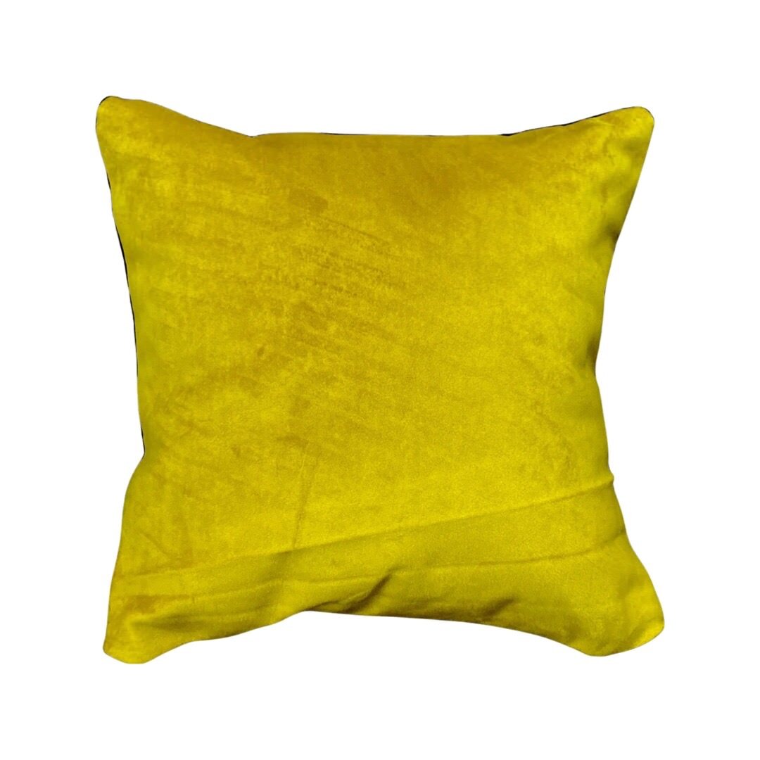 Mustard velvet back of bubblegum lady cushion.