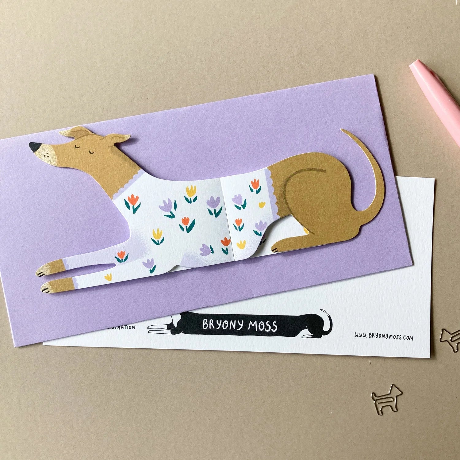 Dog-shaped card with floral pattern on a purple envelope, featuring the brand 'Bryony Moss'.
