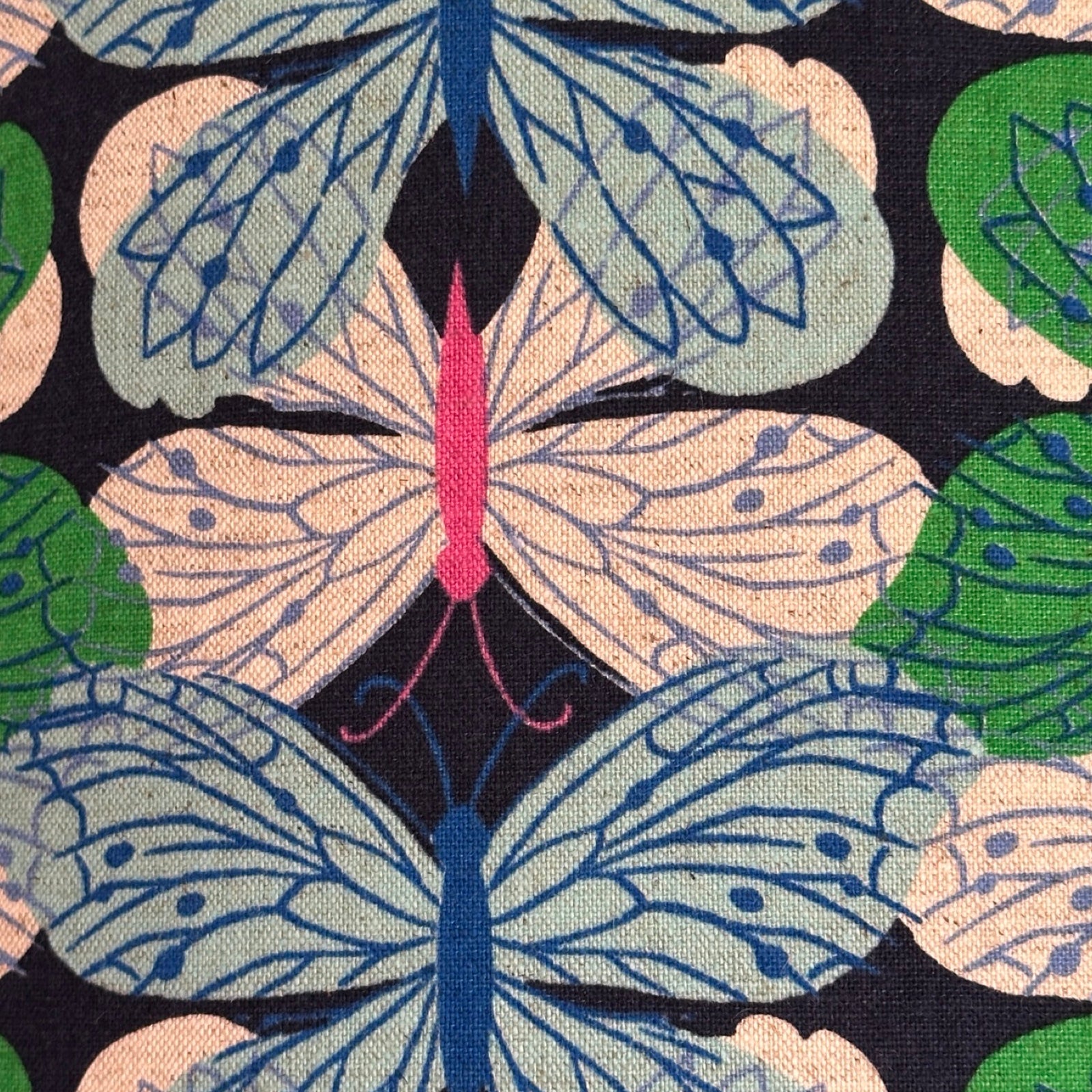 Navy cotton/linen blend fabric with gorgeous green, pale blue and white butterflies.