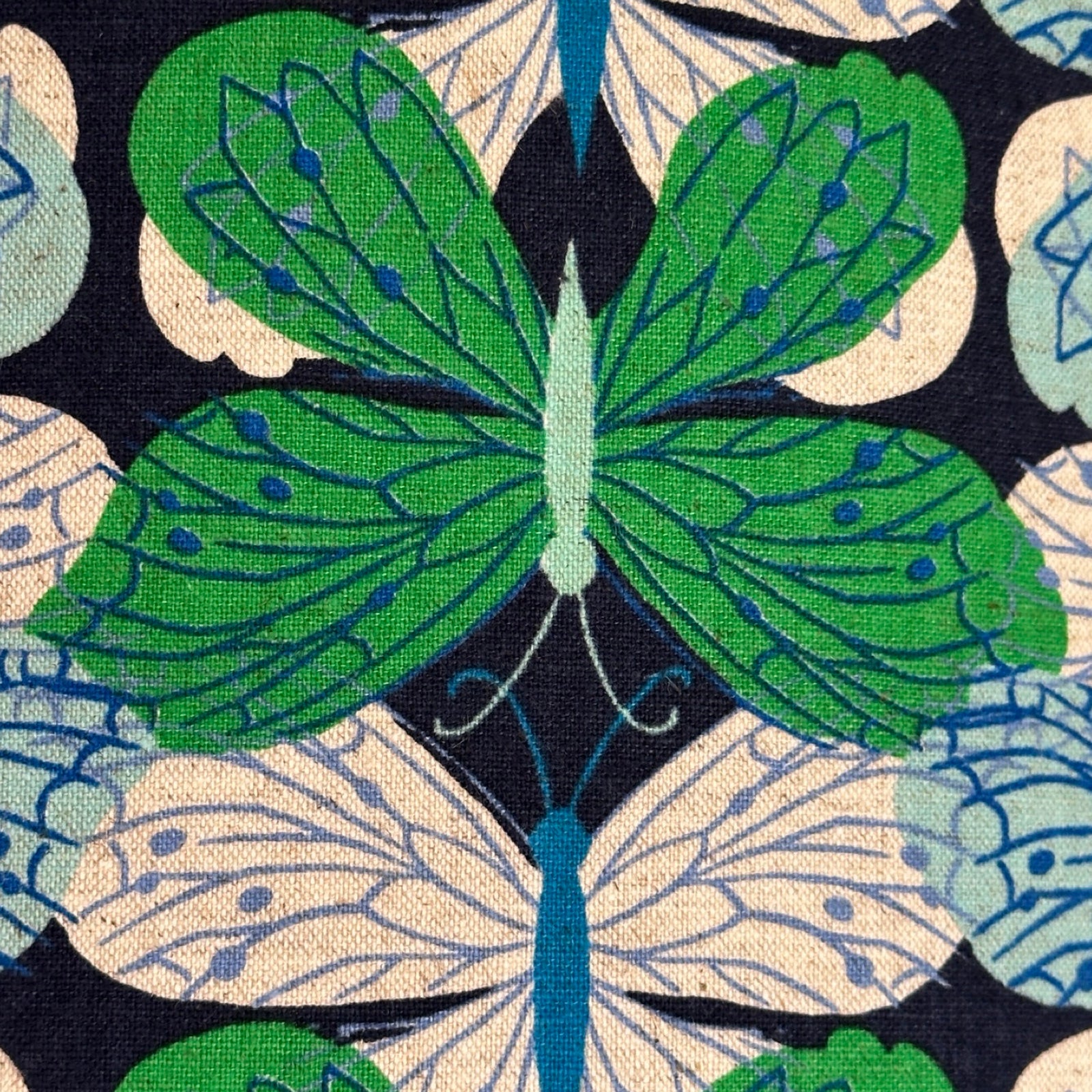 Navy cotton/linen blend fabric with gorgeous green, pale blue and white butterflies.