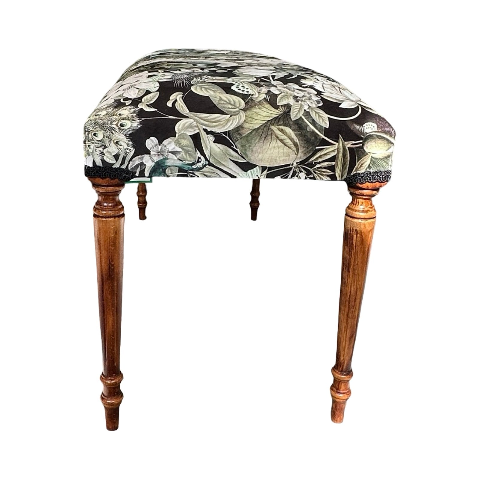 Stool with floral patterned cushion on a white background.