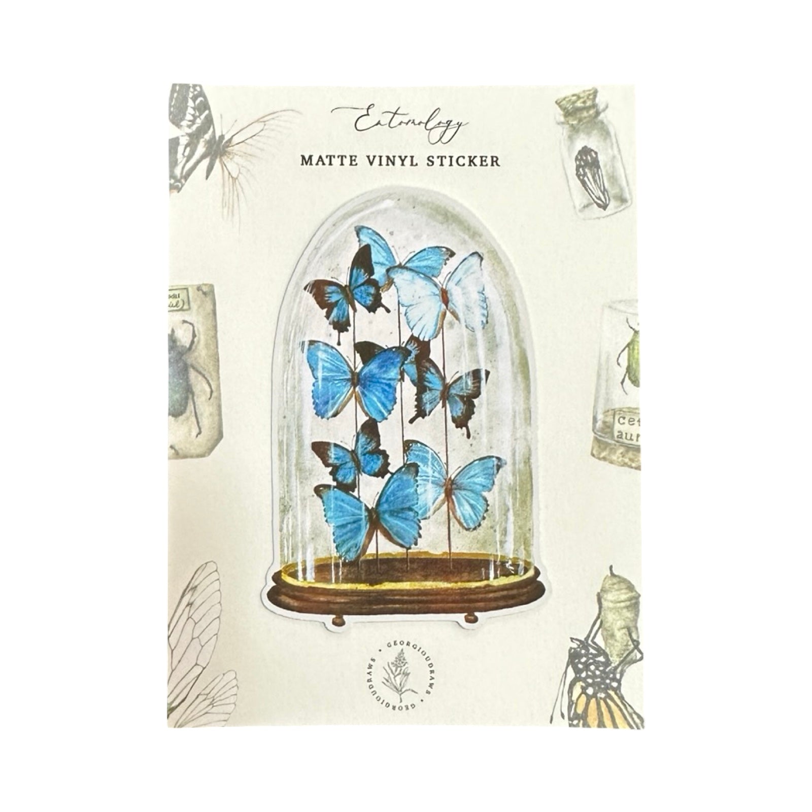 A vinyl watercolour sticker of blue butterflies encased in a glass dome.