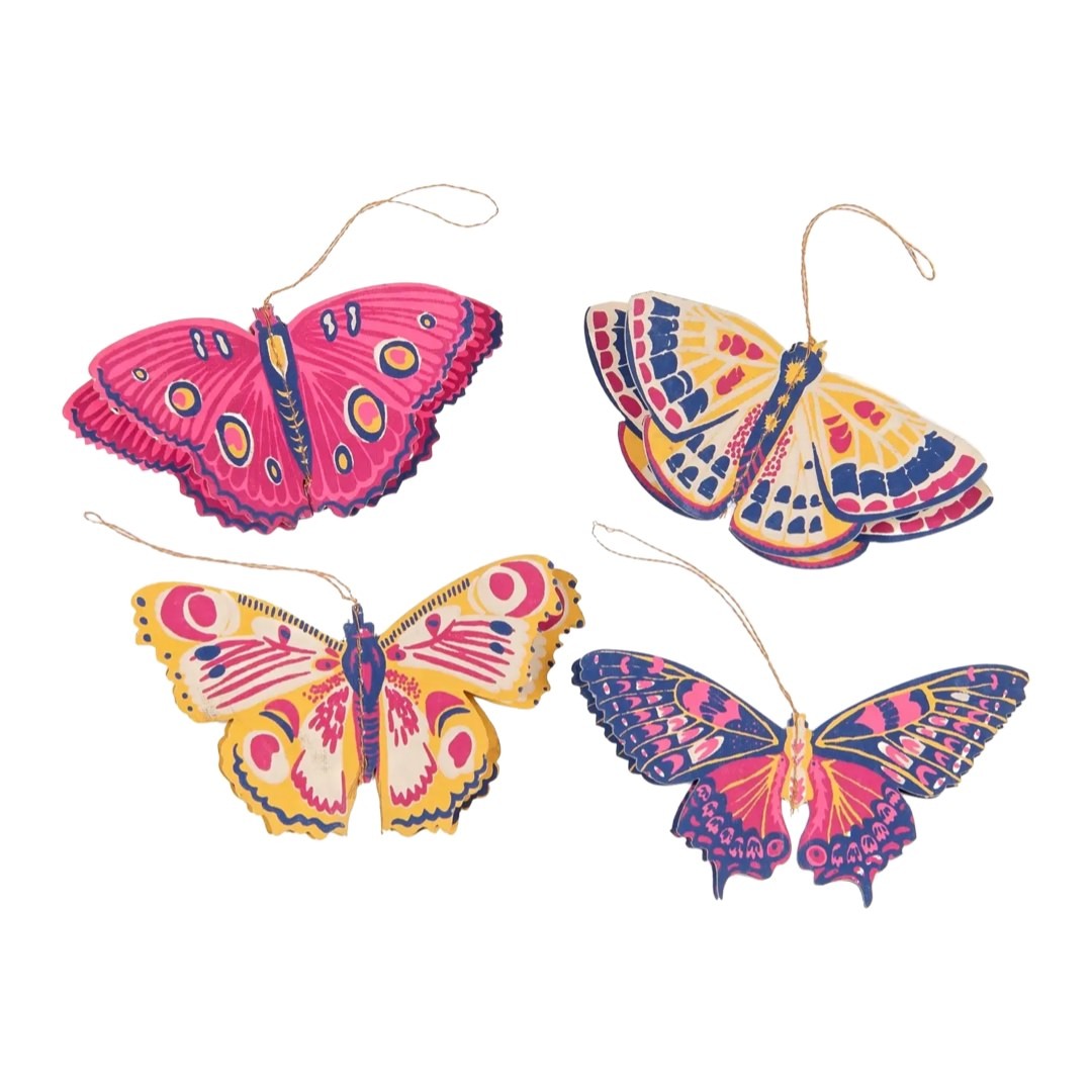 4 pink, yellow and purple paper butterfly decorations.
