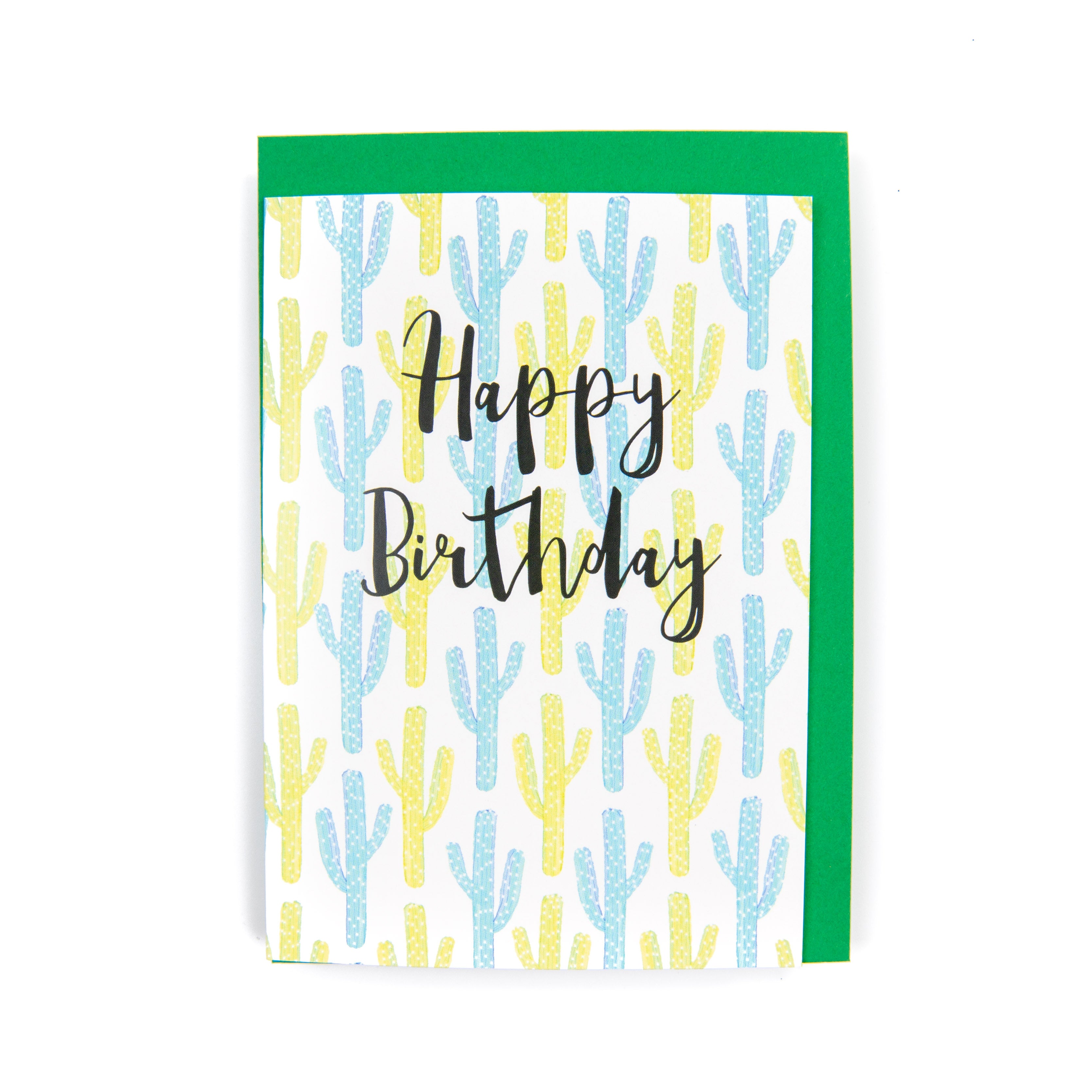 A birthday card with a pattern of colorful cacti and the text 'Happy Birthday' on the front. The card is A6 in size and has a green envelope.