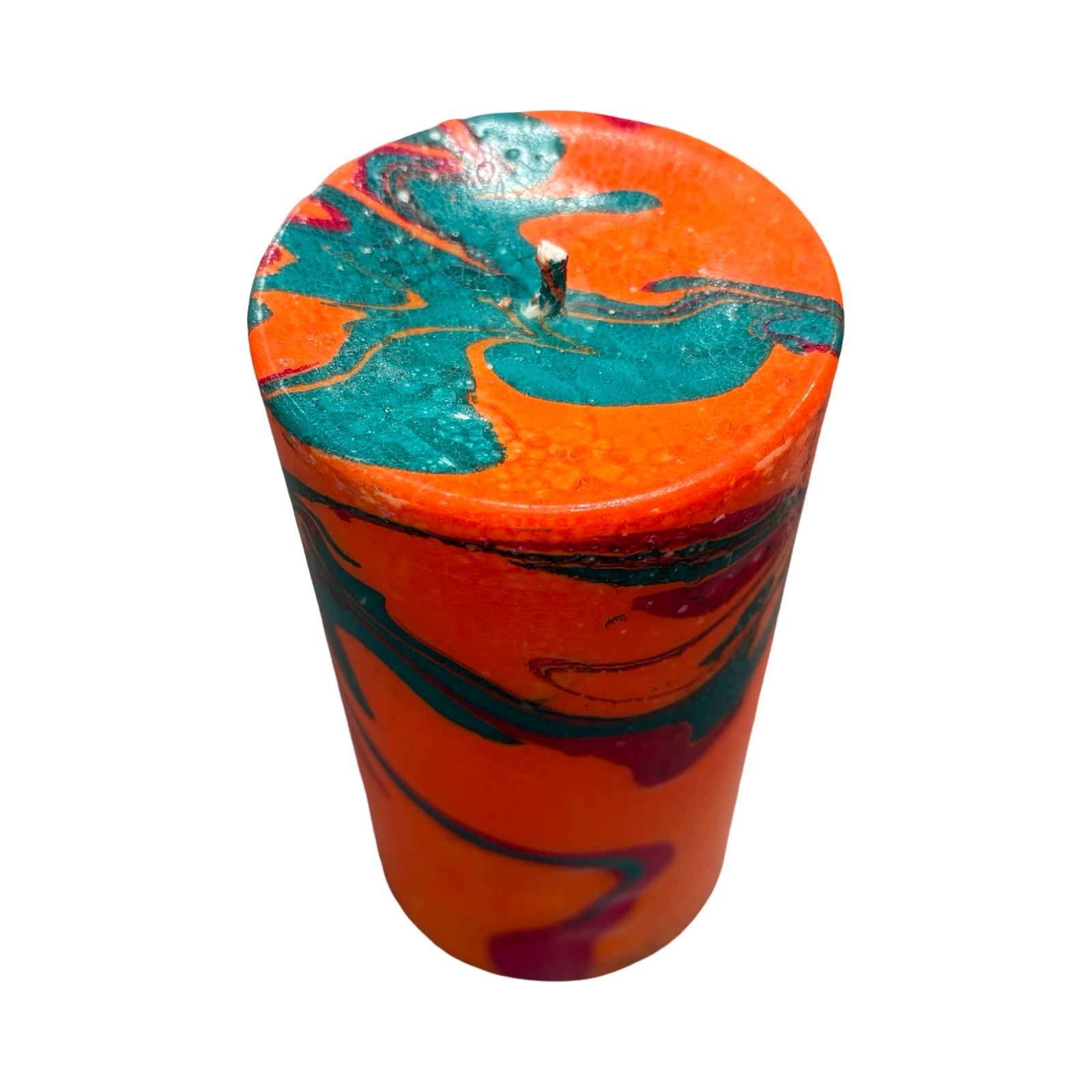 Eye-catching unscented pillar candle hand-poured with soy wax and dip-dyed in teal, dark pink and orange creating the marble swirl.