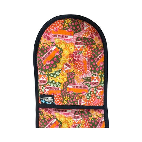 Oven gloves with a repeat pattern illustration of an orange and cream VW campervan against a floral backdrop on the front and a checked pink, orange, green and black patterned reverse.