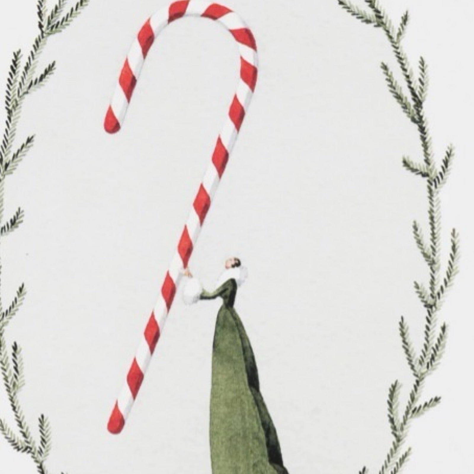 Christmas card featuring a lady in a beautiful green dress holding a giant red and white striped candy cane, framed by green foliage.