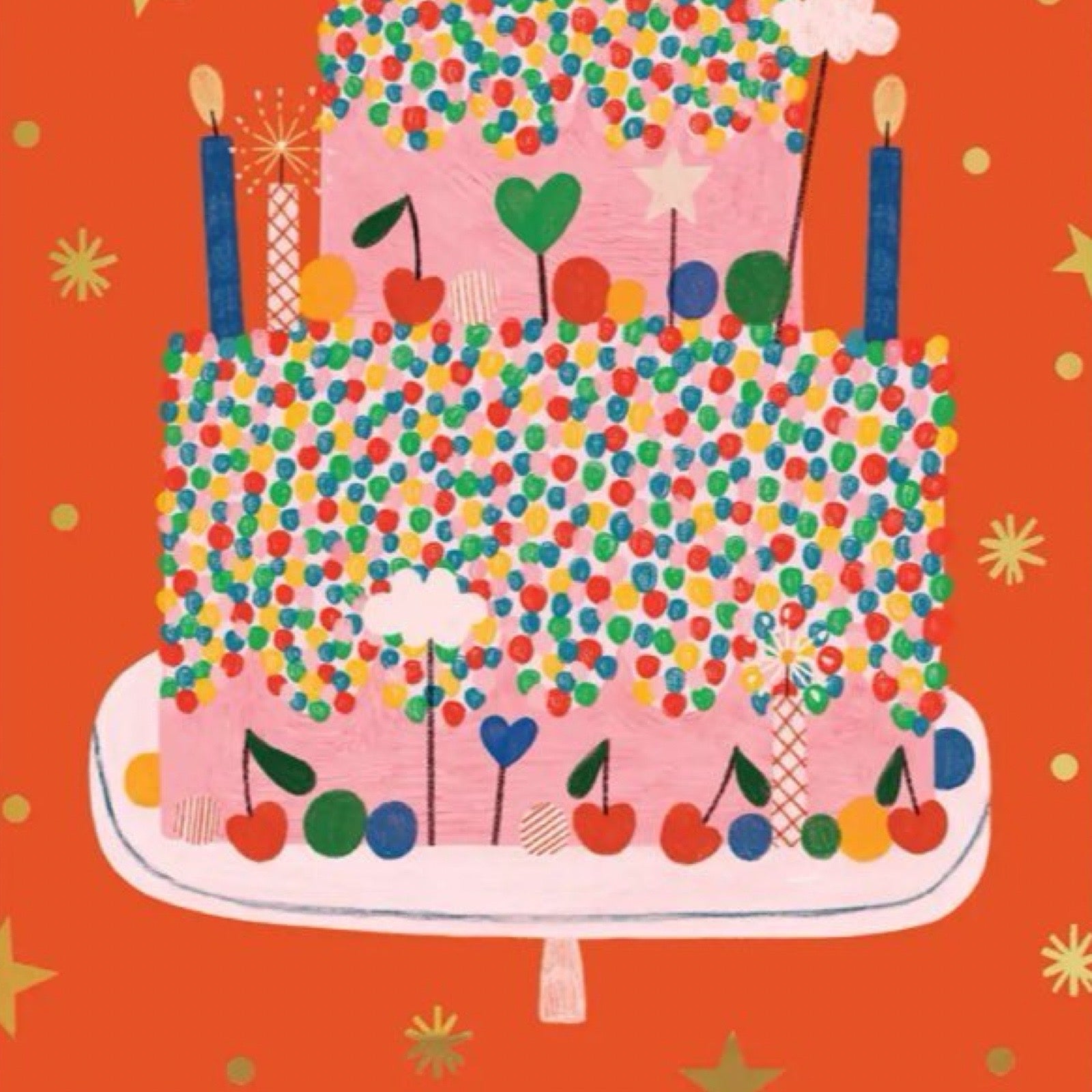 Colourful birthday cake with candles on an orange background.