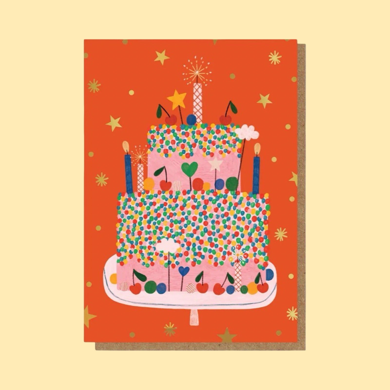 Greeting card with a colourful birthday cake illustration on a yellow background.