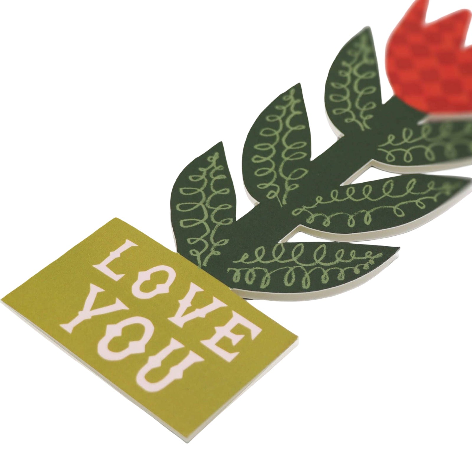 A gorgeous floral-shaped card of a red checkerboard lily with the text ‘Love You’ on the base.