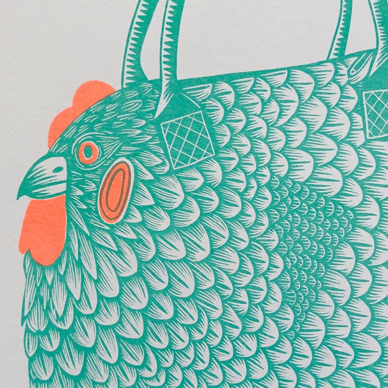 A risograph print of a green handbag with a chicken's head.
