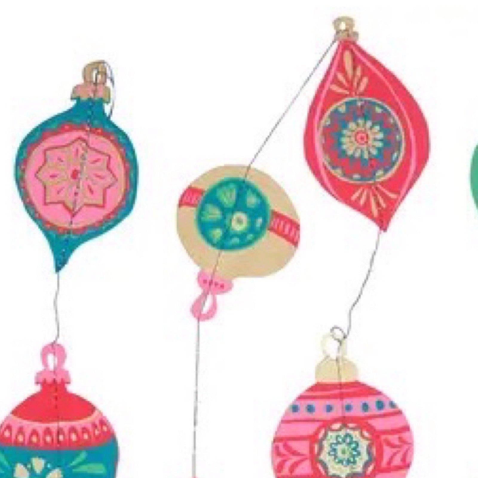 Colourful decorative hanging ornaments with floral patterns on a white background.