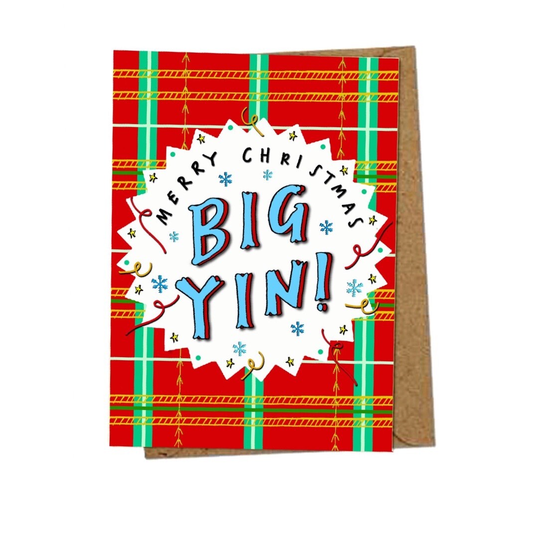 Christmas card with the text 'Merry Christmas Big Yin' inside a white pointy-edged circle on a red tartan background.