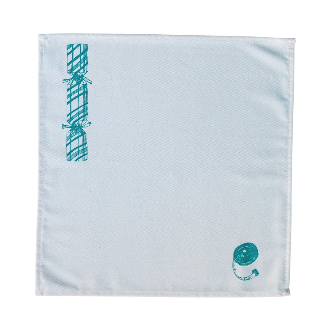 Christmas cracker napkin in green.