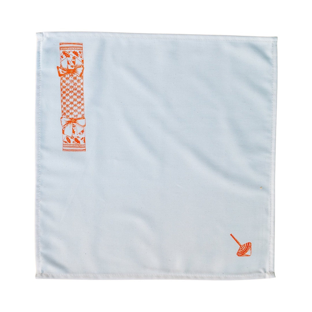 Christmas cracker napkin in orange.